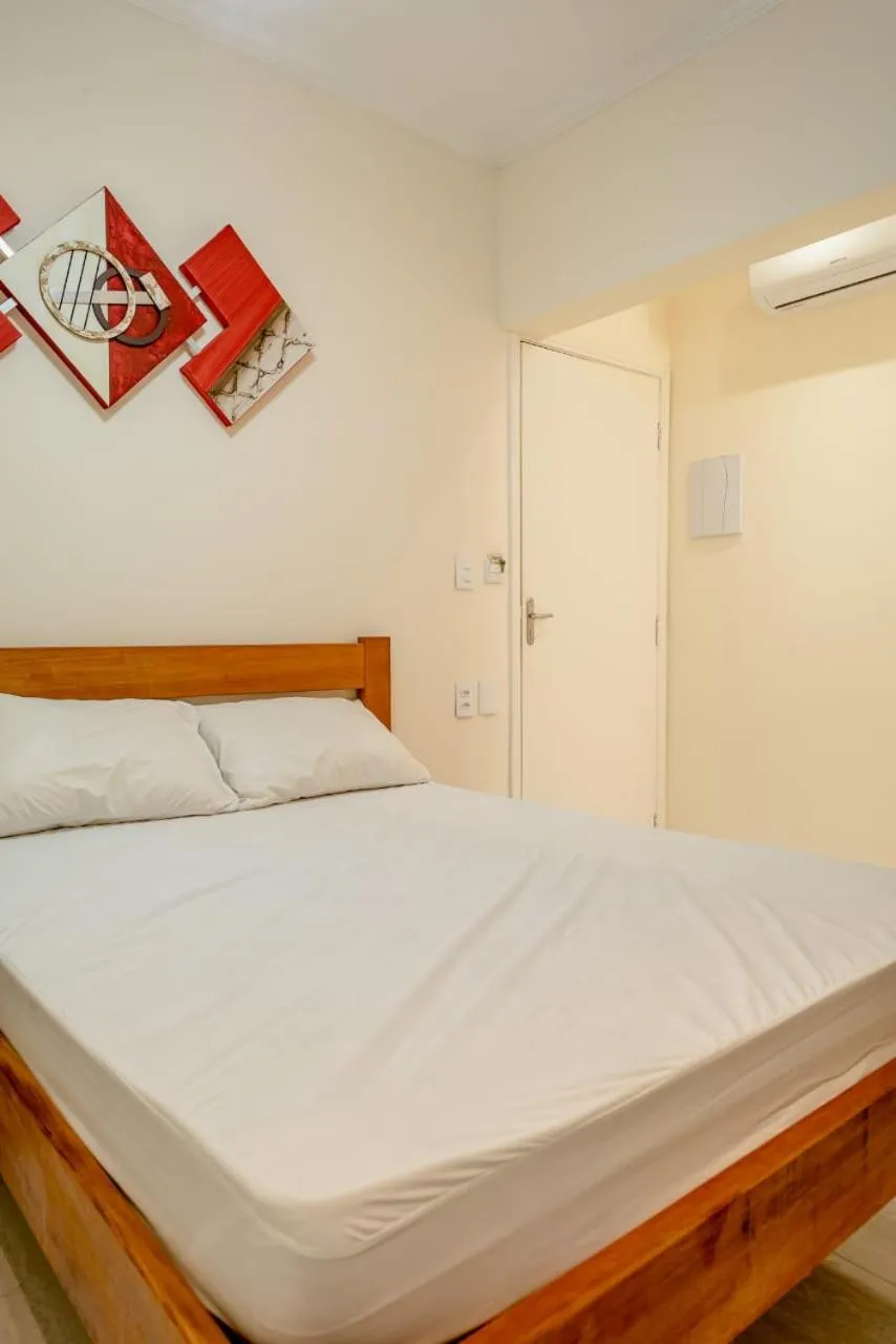 Bed in Pousada Oásis