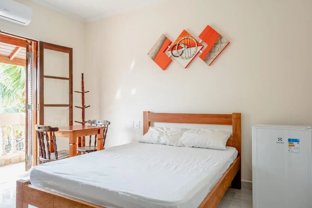 Photo of the whole room, Bed in Pousada Oásis