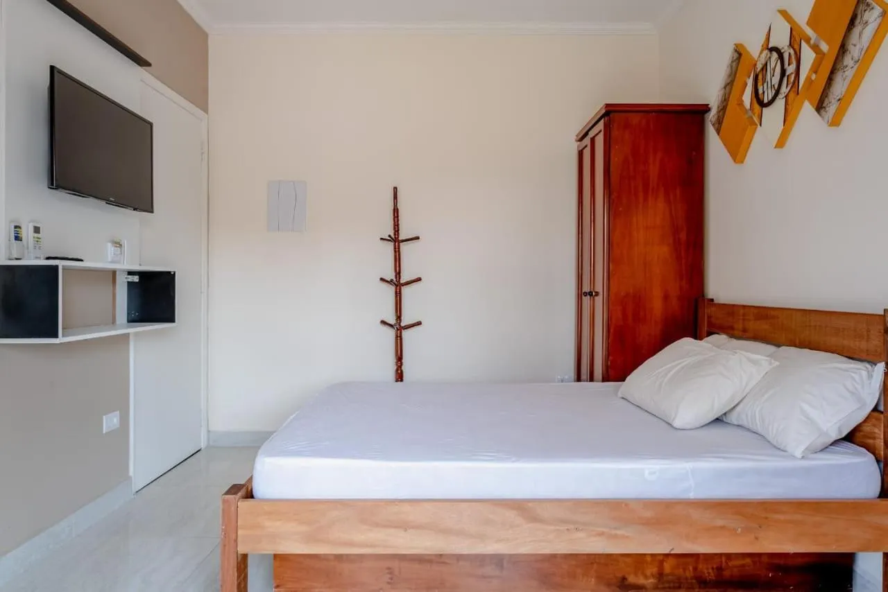 Bed in Pousada Oásis