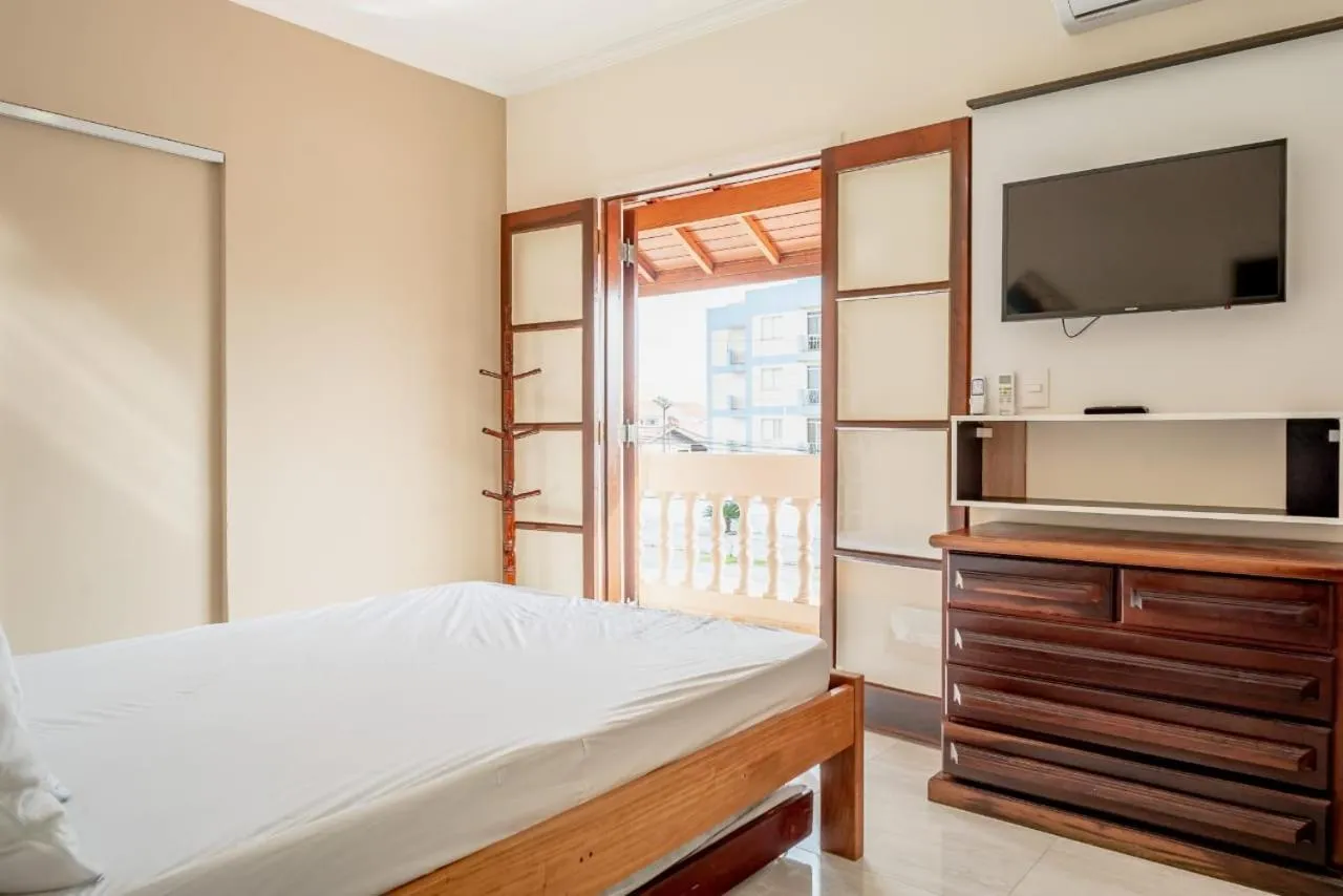 Bed in Pousada Oásis