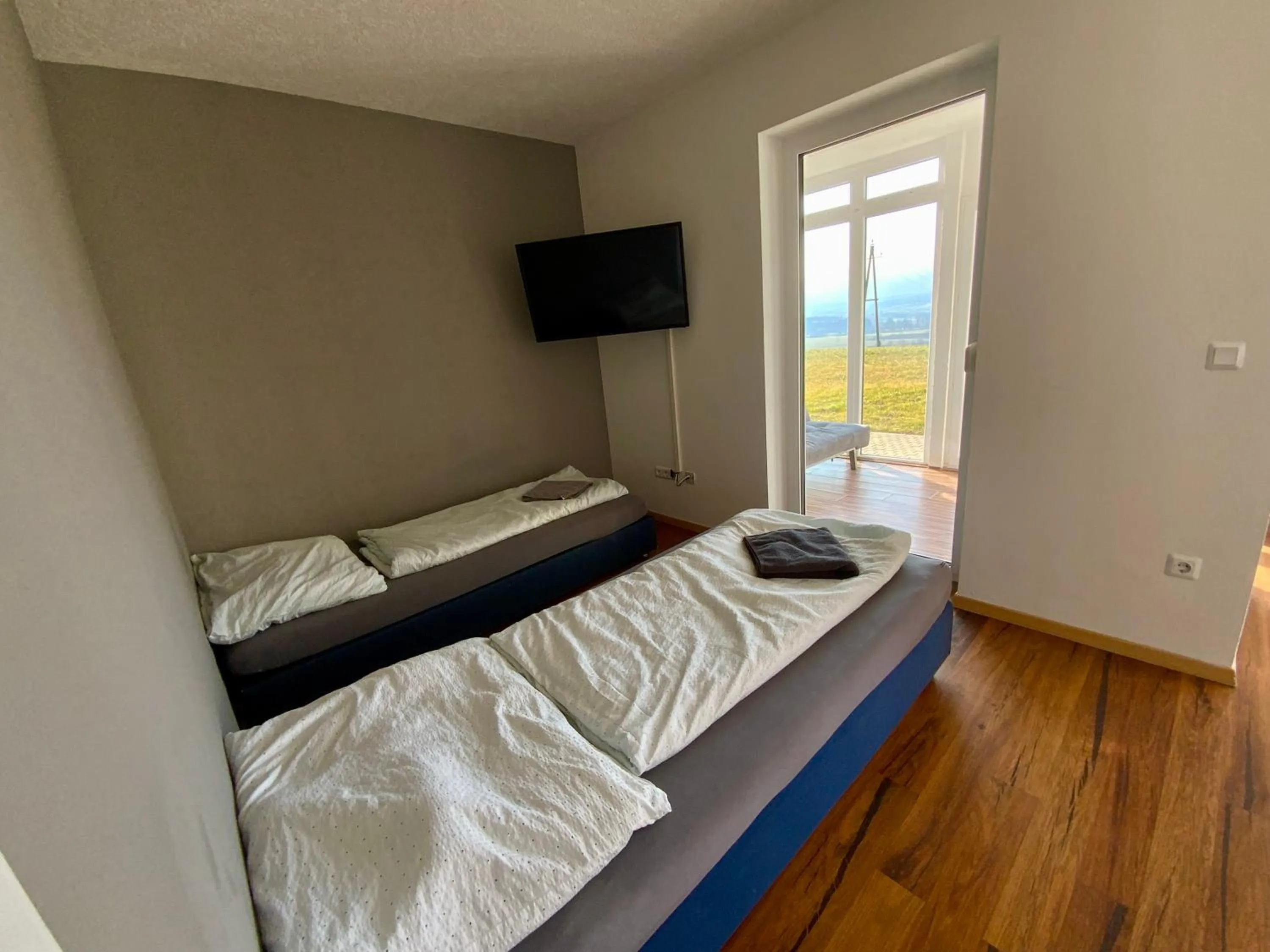 Bed in Geinberg Suites & Via Nova Lodges