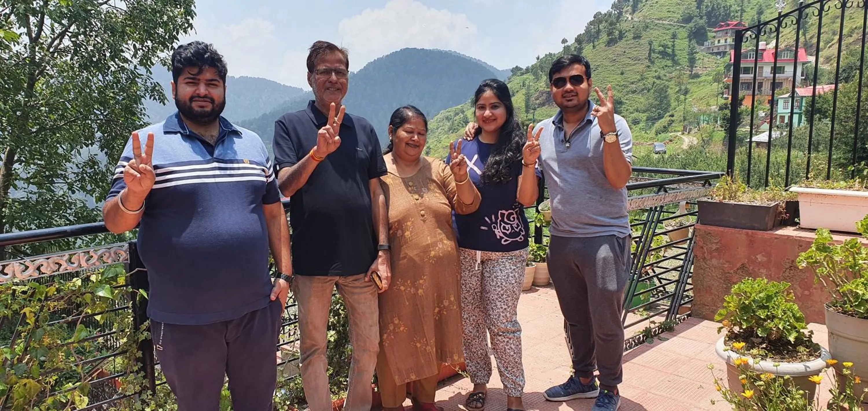 group of guests in Dawn N Dusk Glamping tents with quintessential valley view