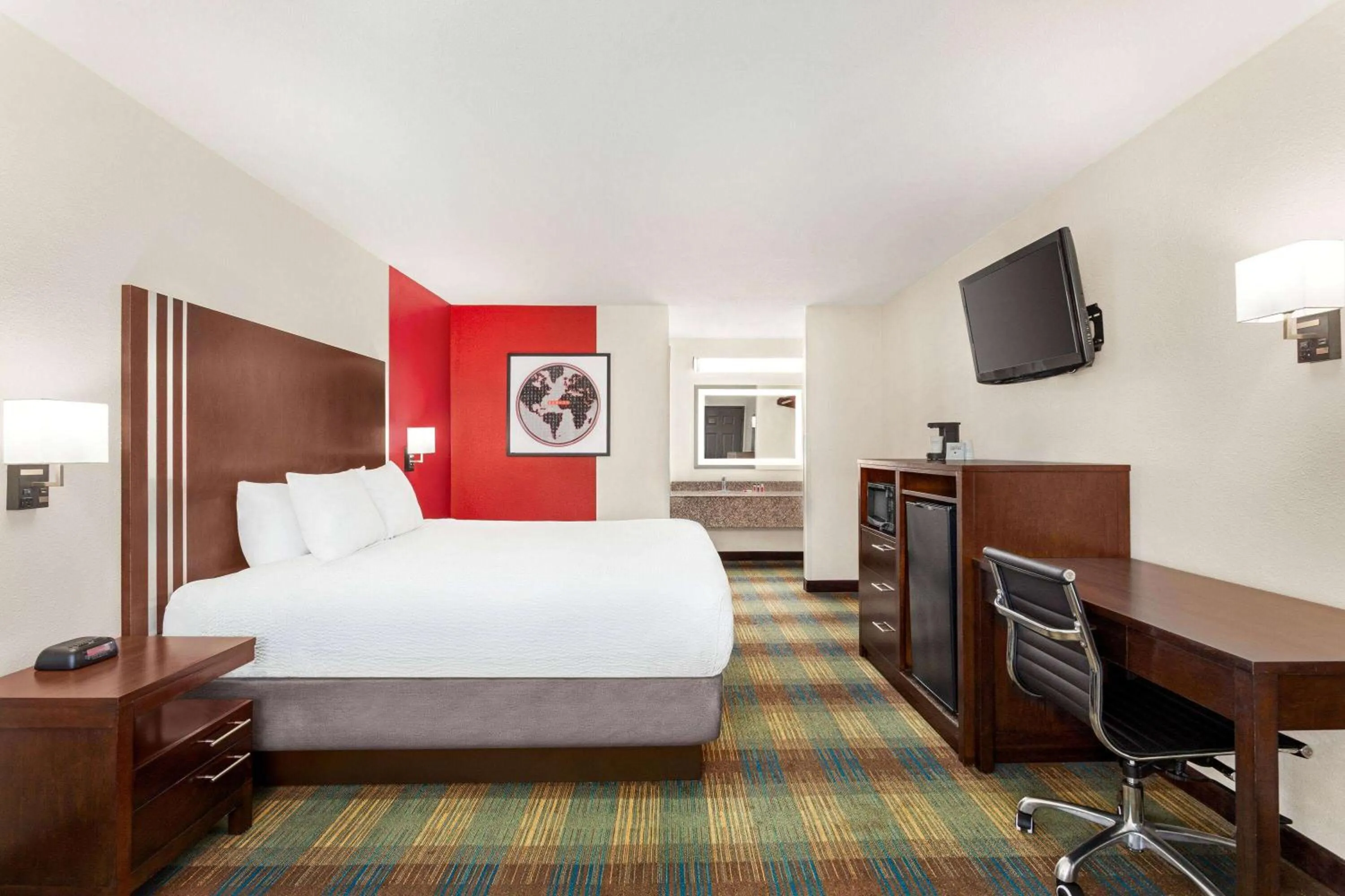 Photo of the whole room, Bed in Ramada by Wyndham San Antonio Near SeaWorld - Lackland AFB