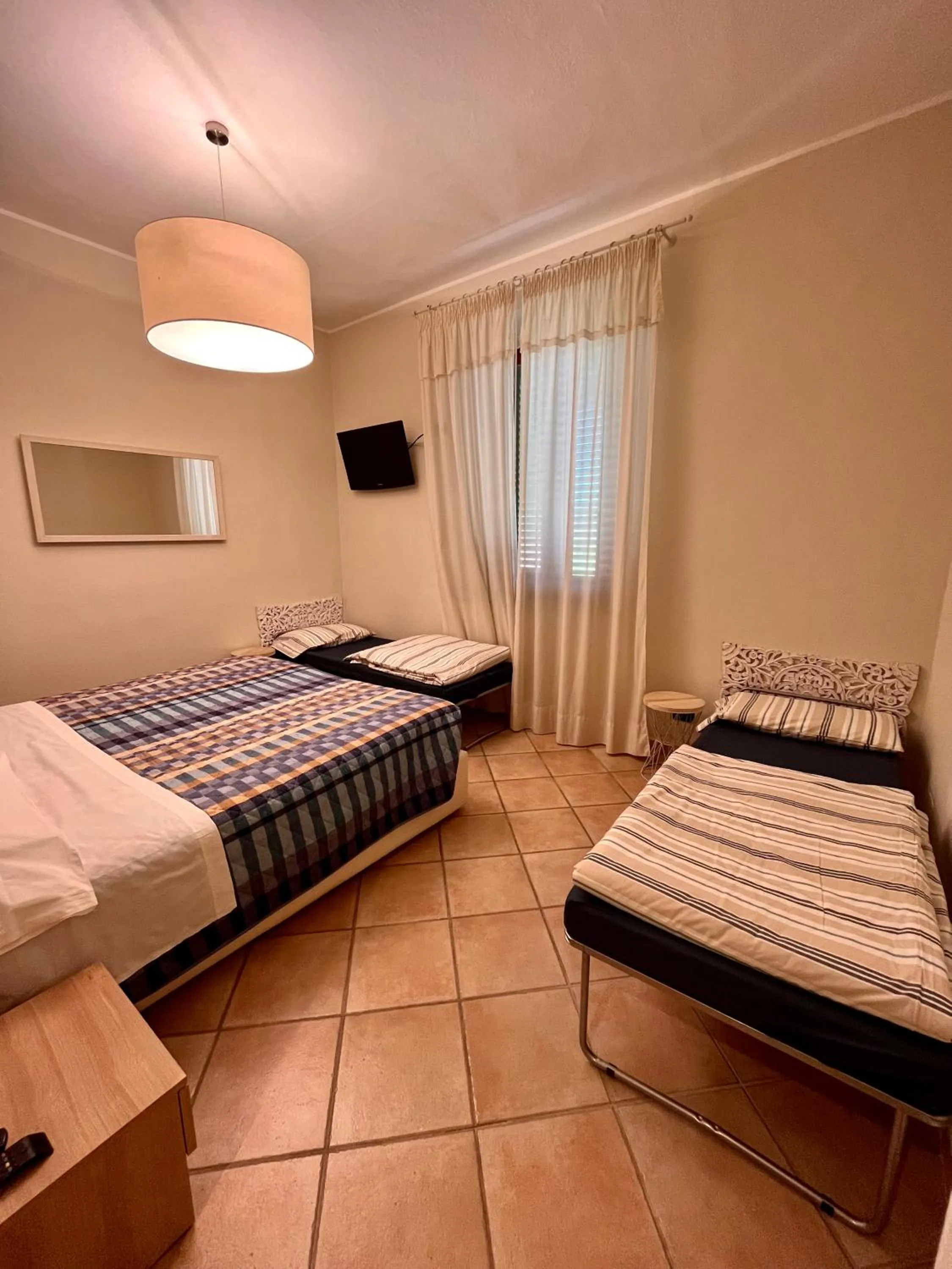 Photo of the whole room, Bed in Albergo Africa