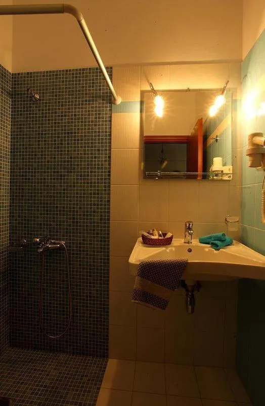 Bathroom in Pantheon Hotel & Suites