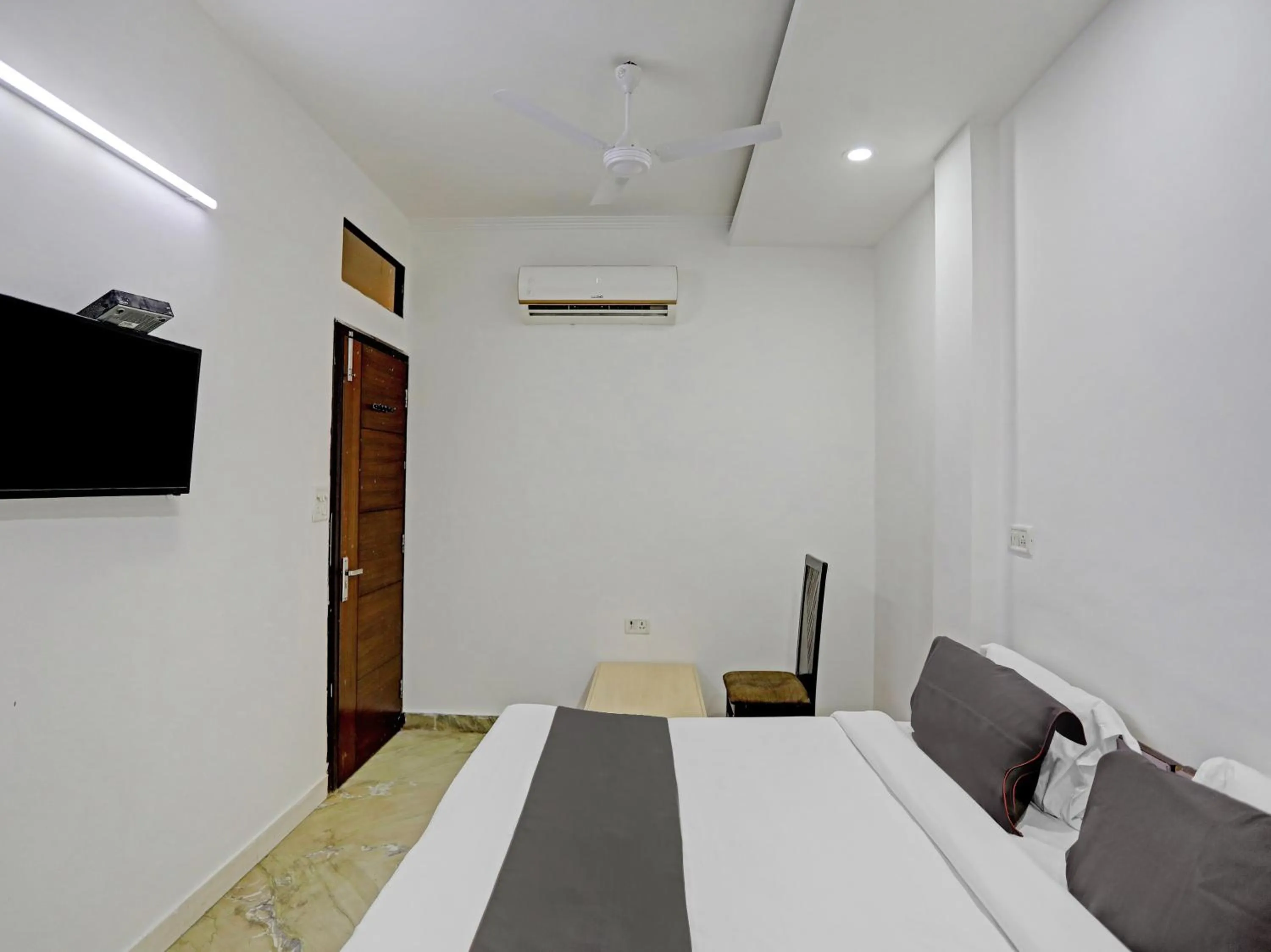 Bedroom in The Pinaki Residency