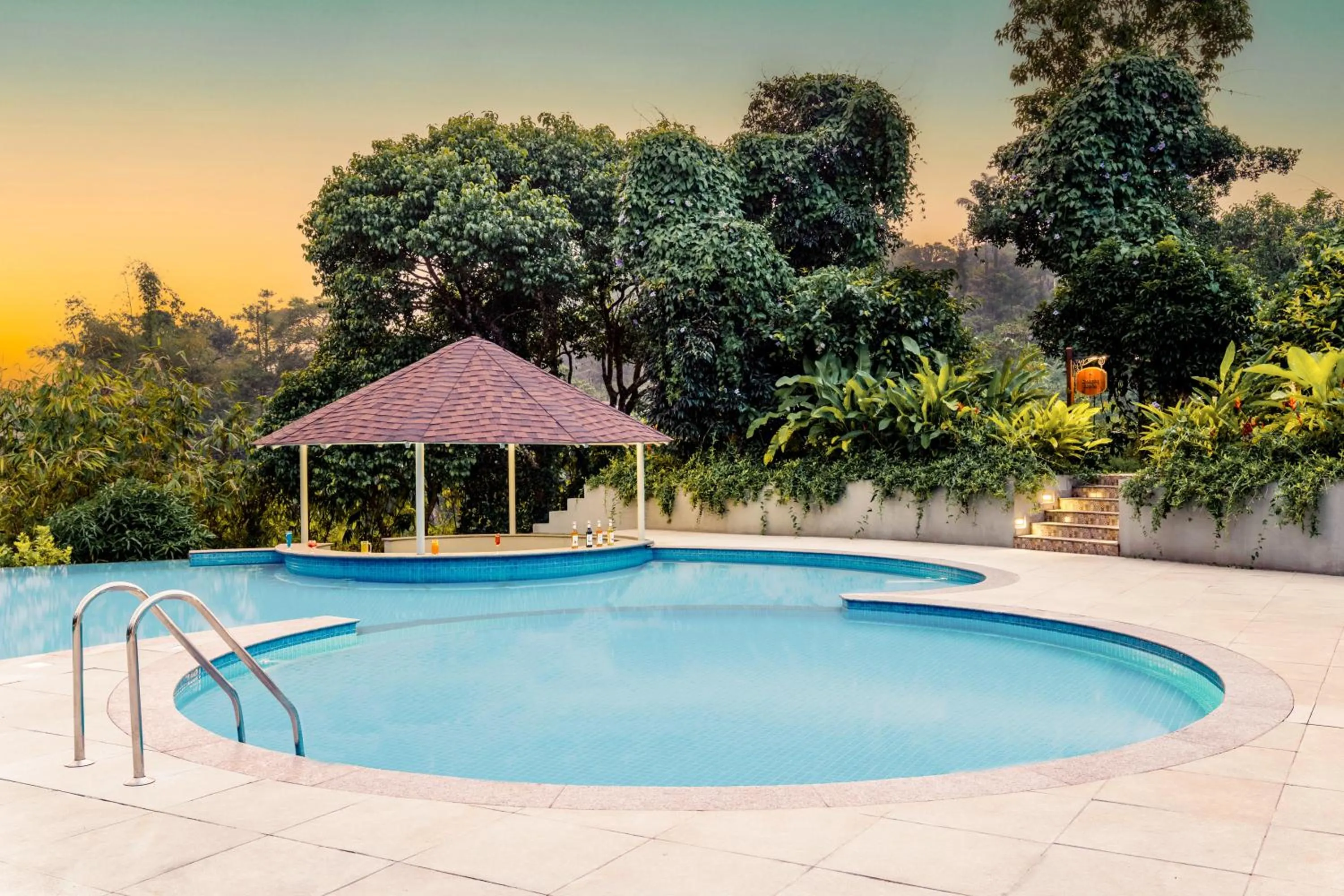 Swimming pool in Aurika, Coorg Luxury by Lemon Tree Hotels
