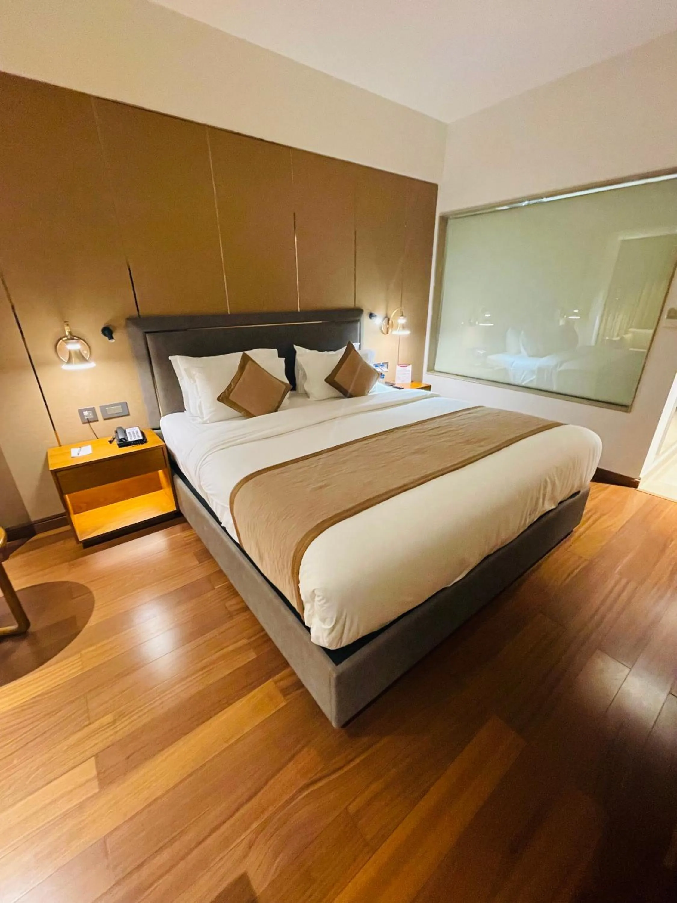 Photo of the whole room, Bed in Pride Hotel Udaipur