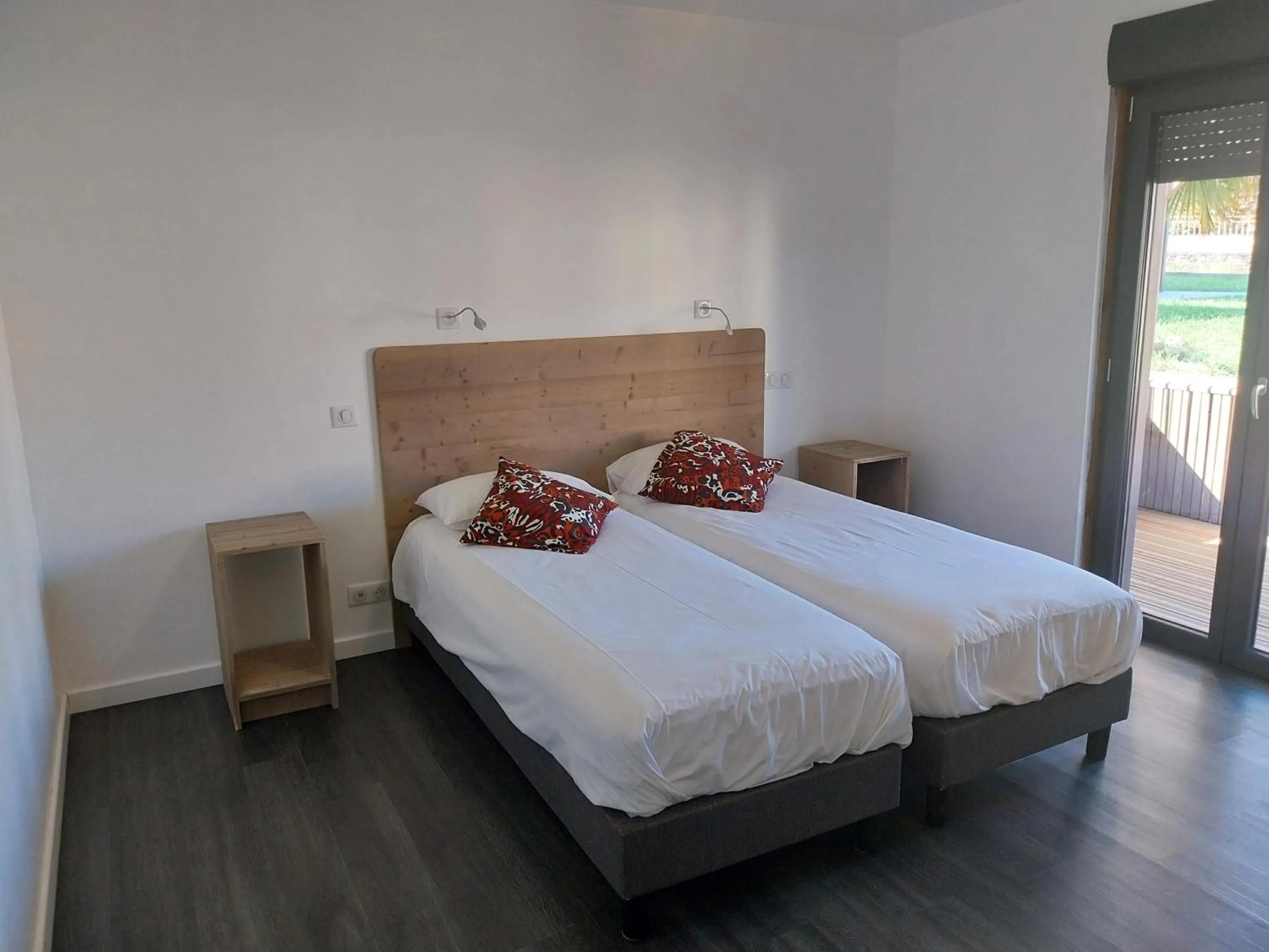 Bed in Logis Hôtel Restaurant Cruzel