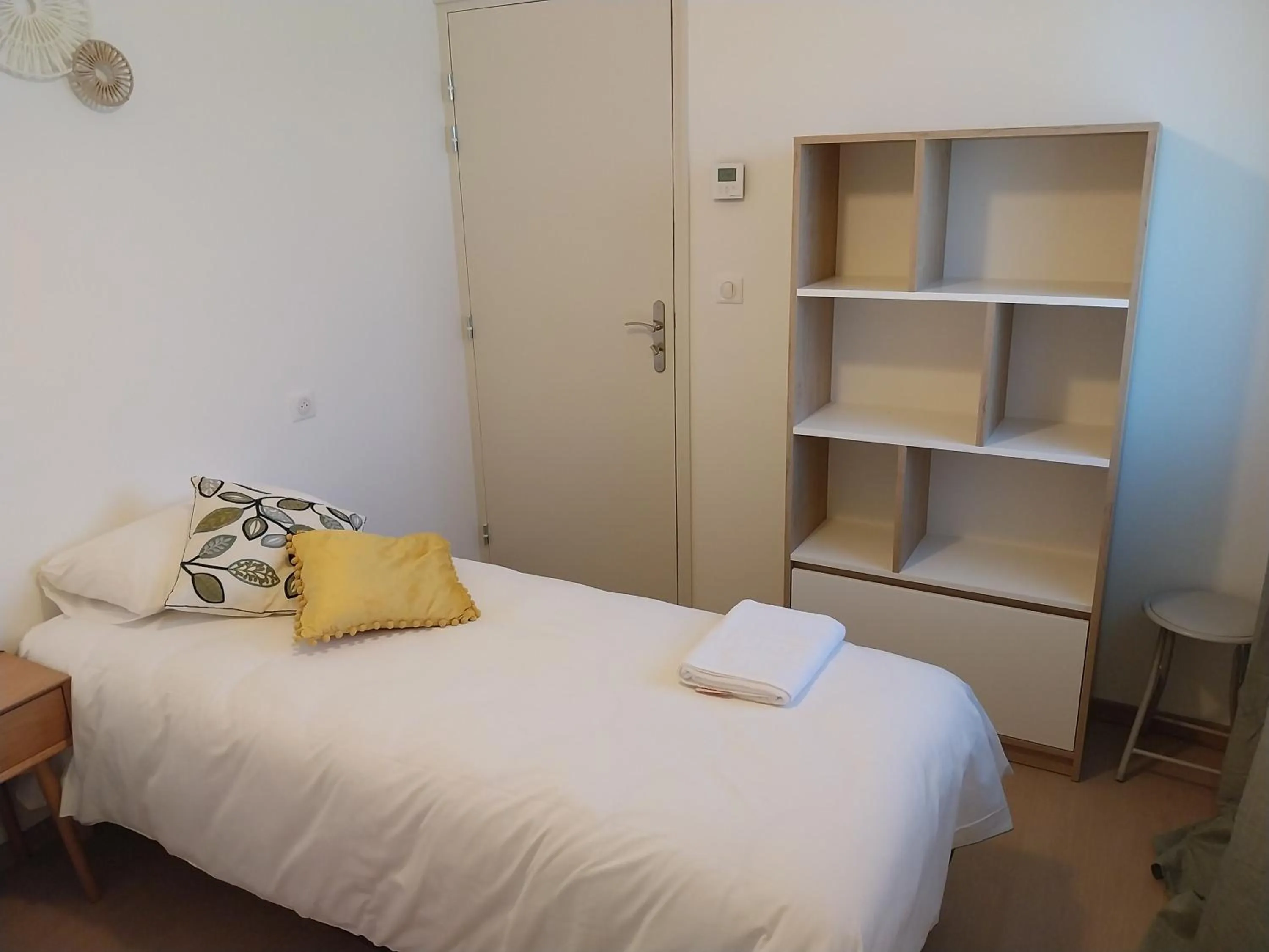 Bed in Logis Hôtel Restaurant Cruzel