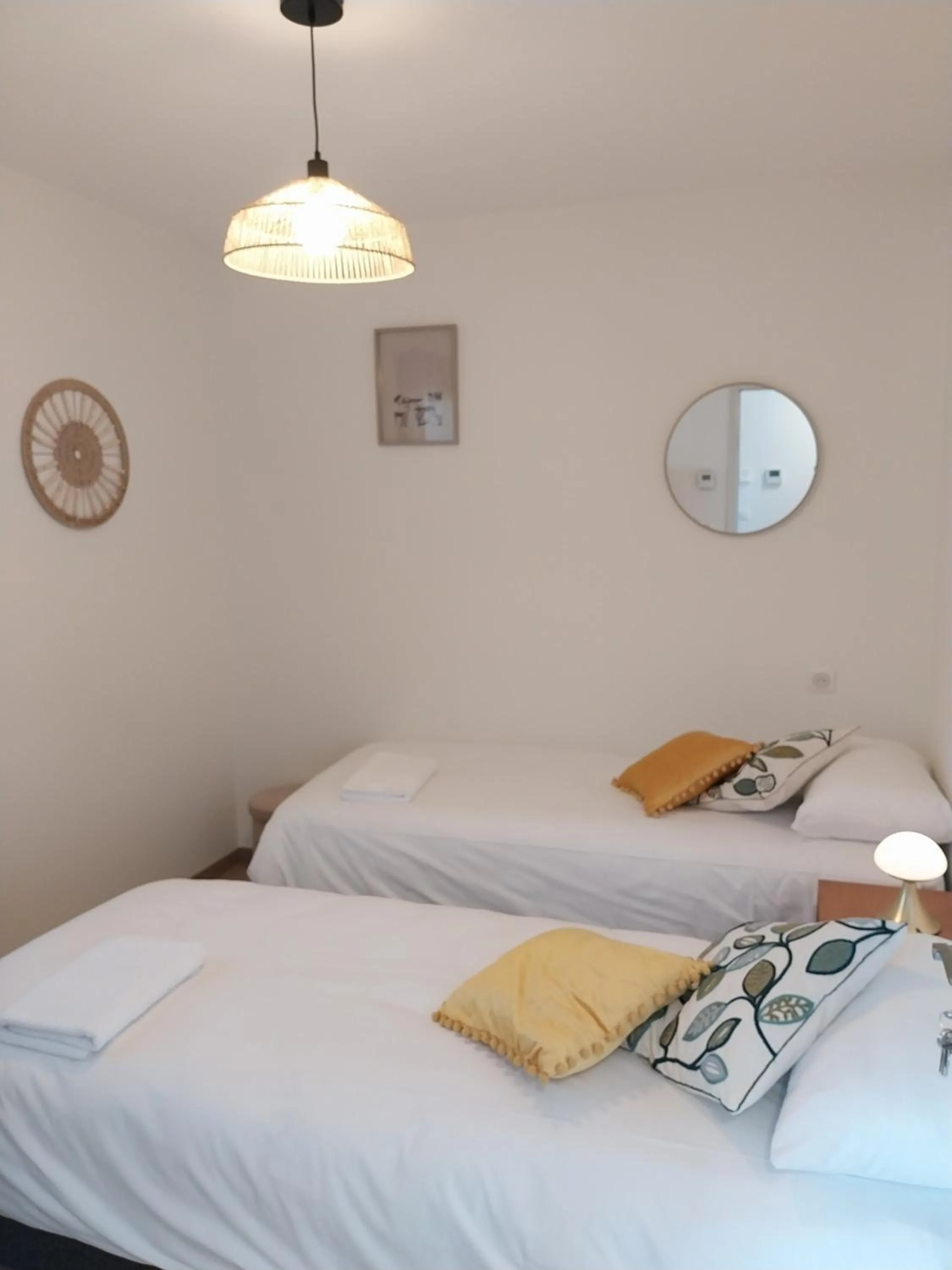 Bed in Logis Hôtel Restaurant Cruzel