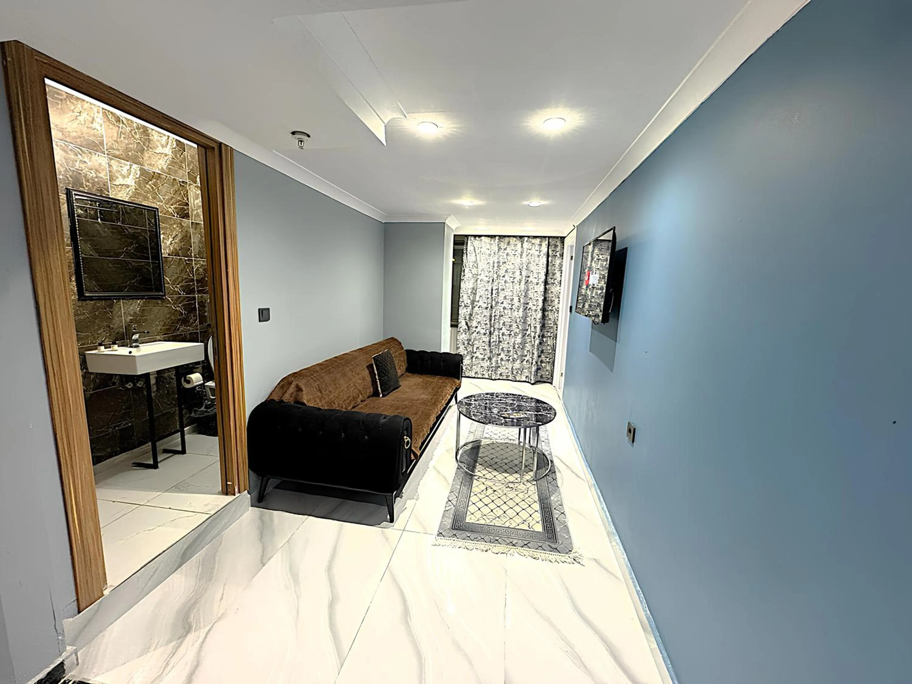 Bed in Grand Lara Hotel & Apartments