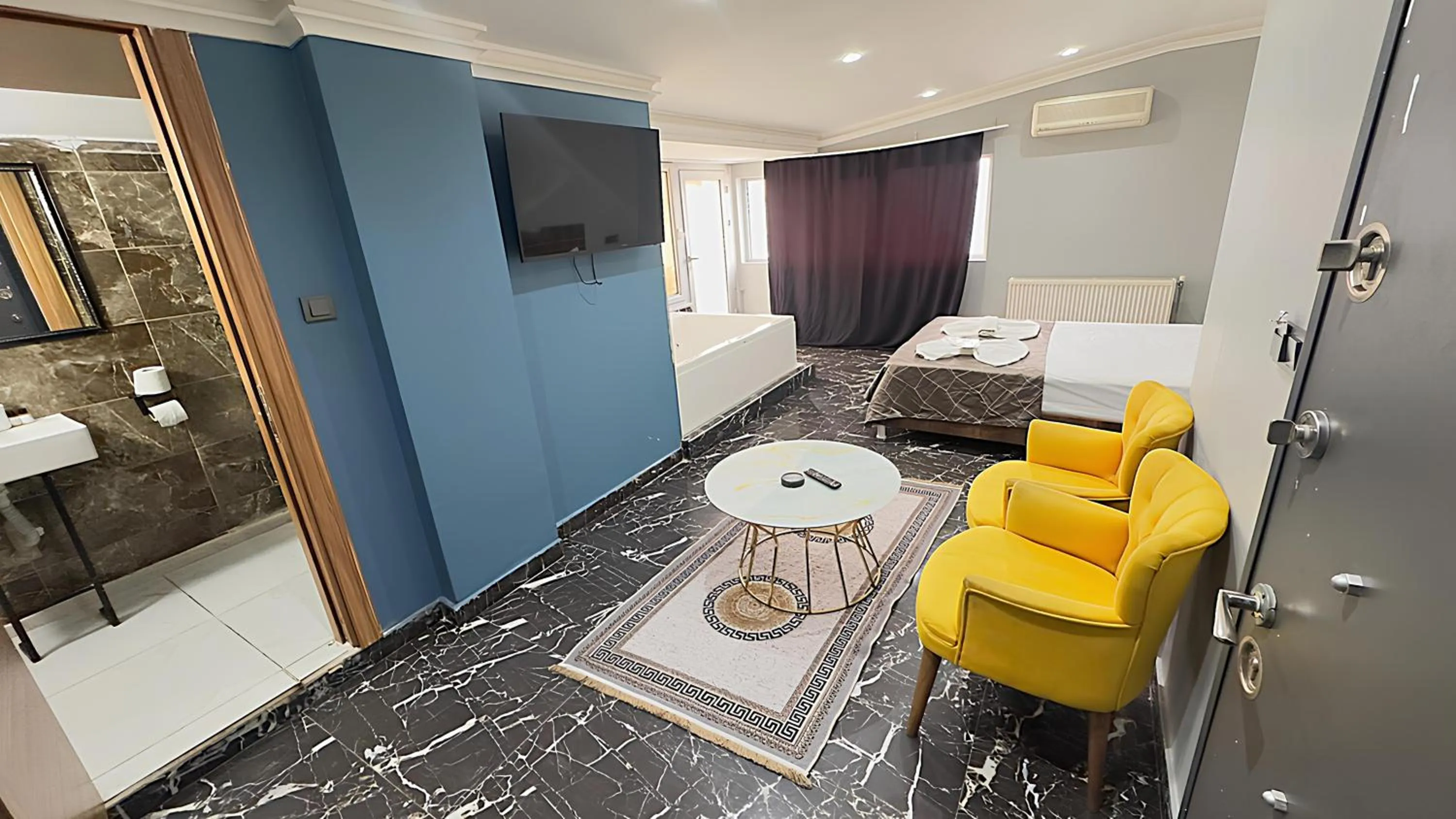 Bed in Grand Lara Hotel & Apartments