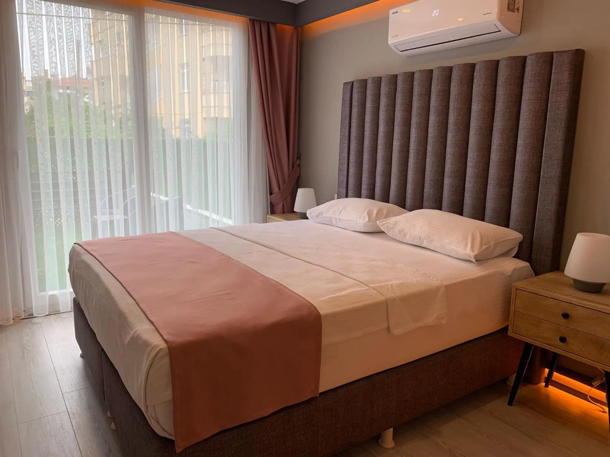 Bed in L'opera Deluxe Hotel