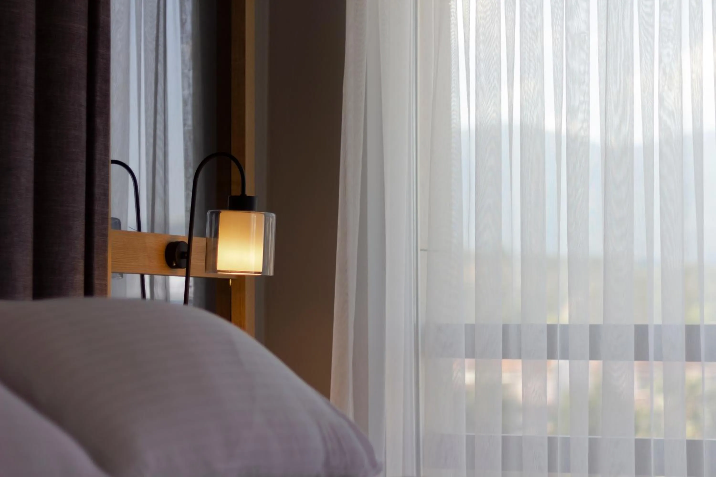 Bed in L'opera Deluxe Hotel