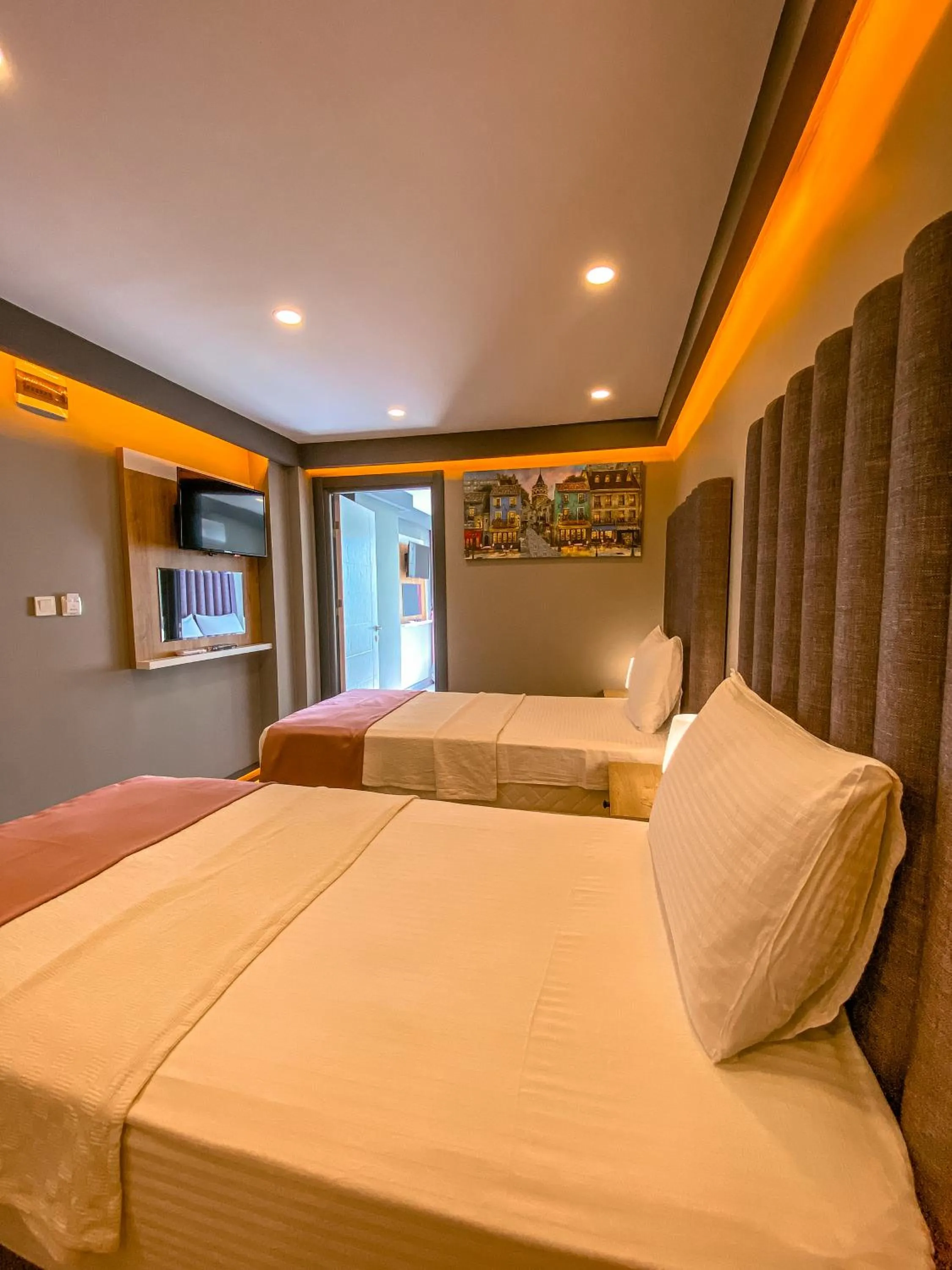 Bed in L'opera Deluxe Hotel