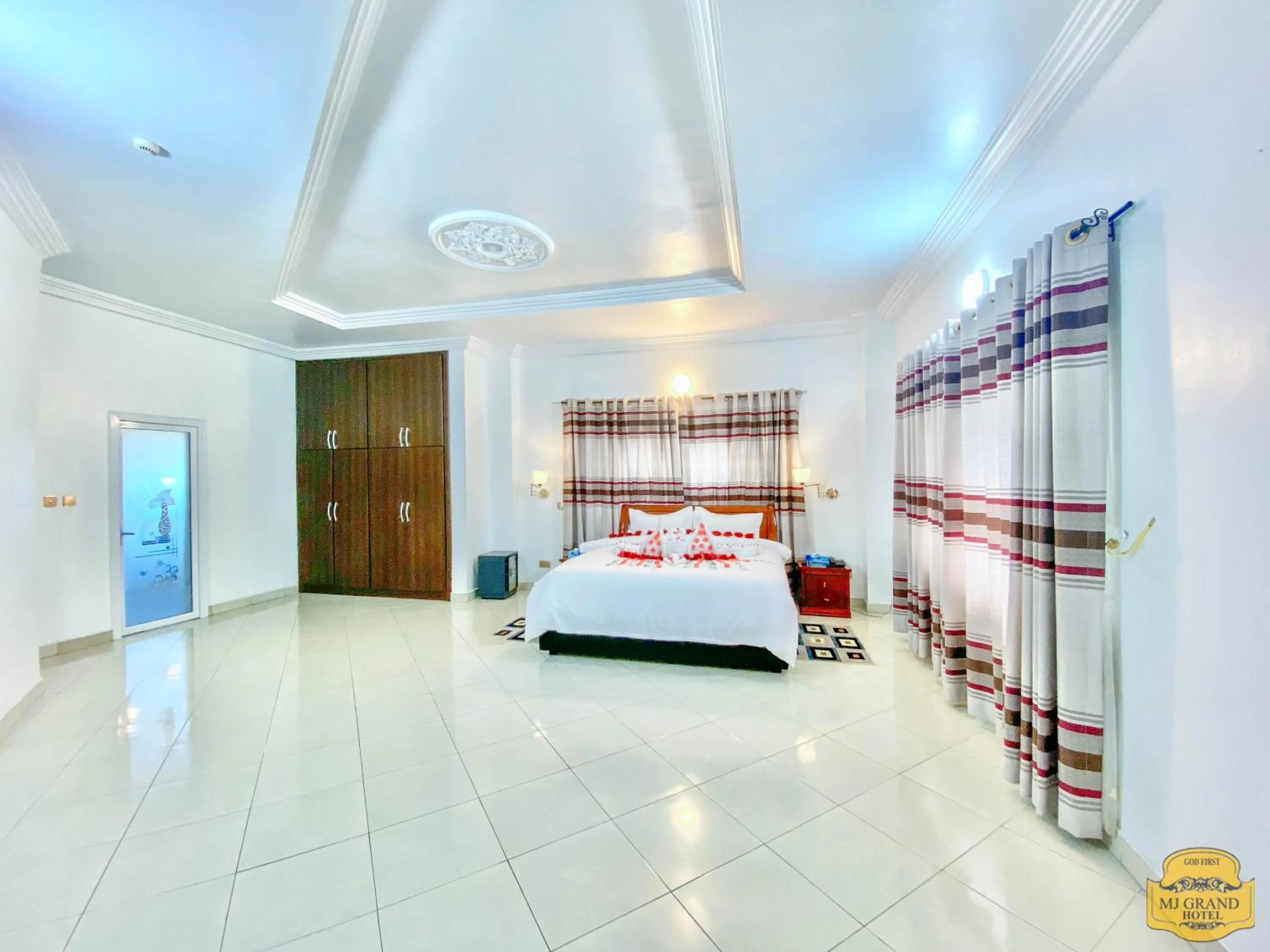 Photo of the whole room, Bed in MJ Grand Hotel