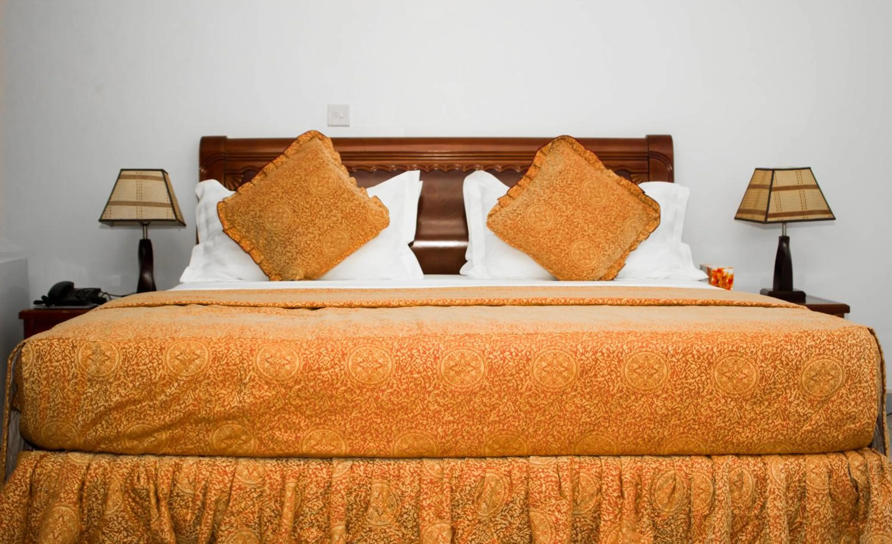 Bed in MJ Grand Hotel