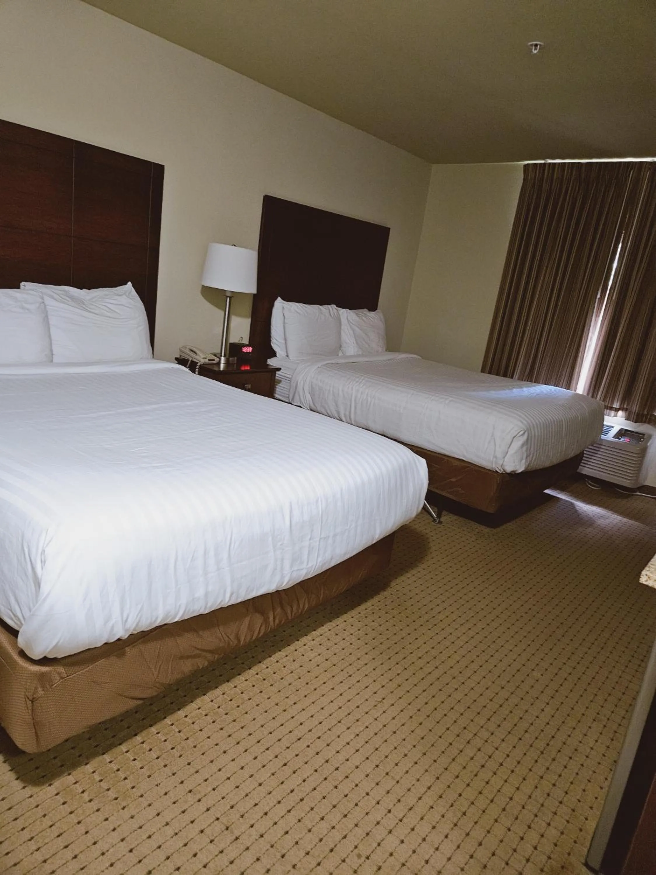 Bed in Cobblestone Inn & Suites - Bloomfield
