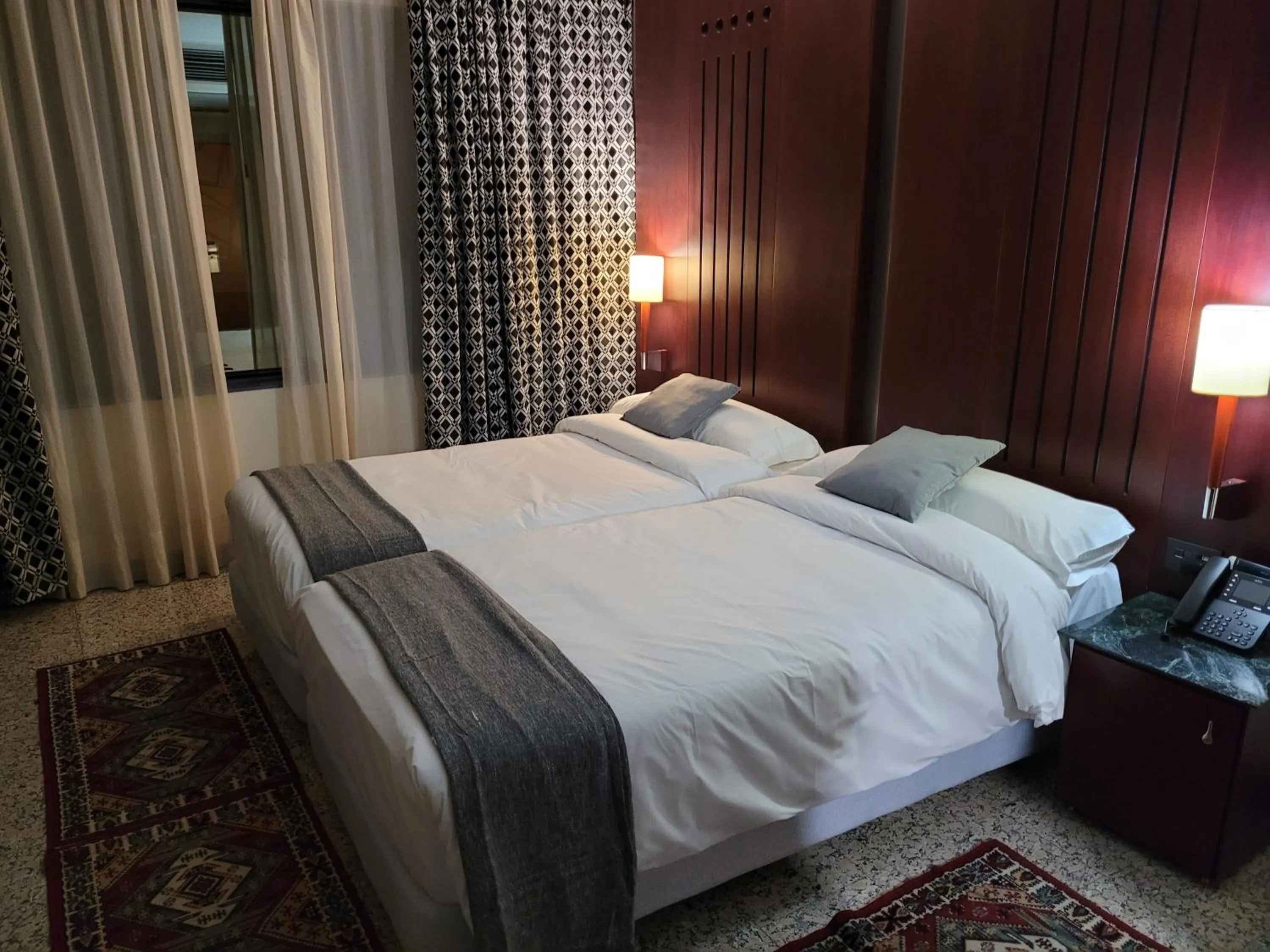 Bed in Hotel Amaltea by Executive Sport