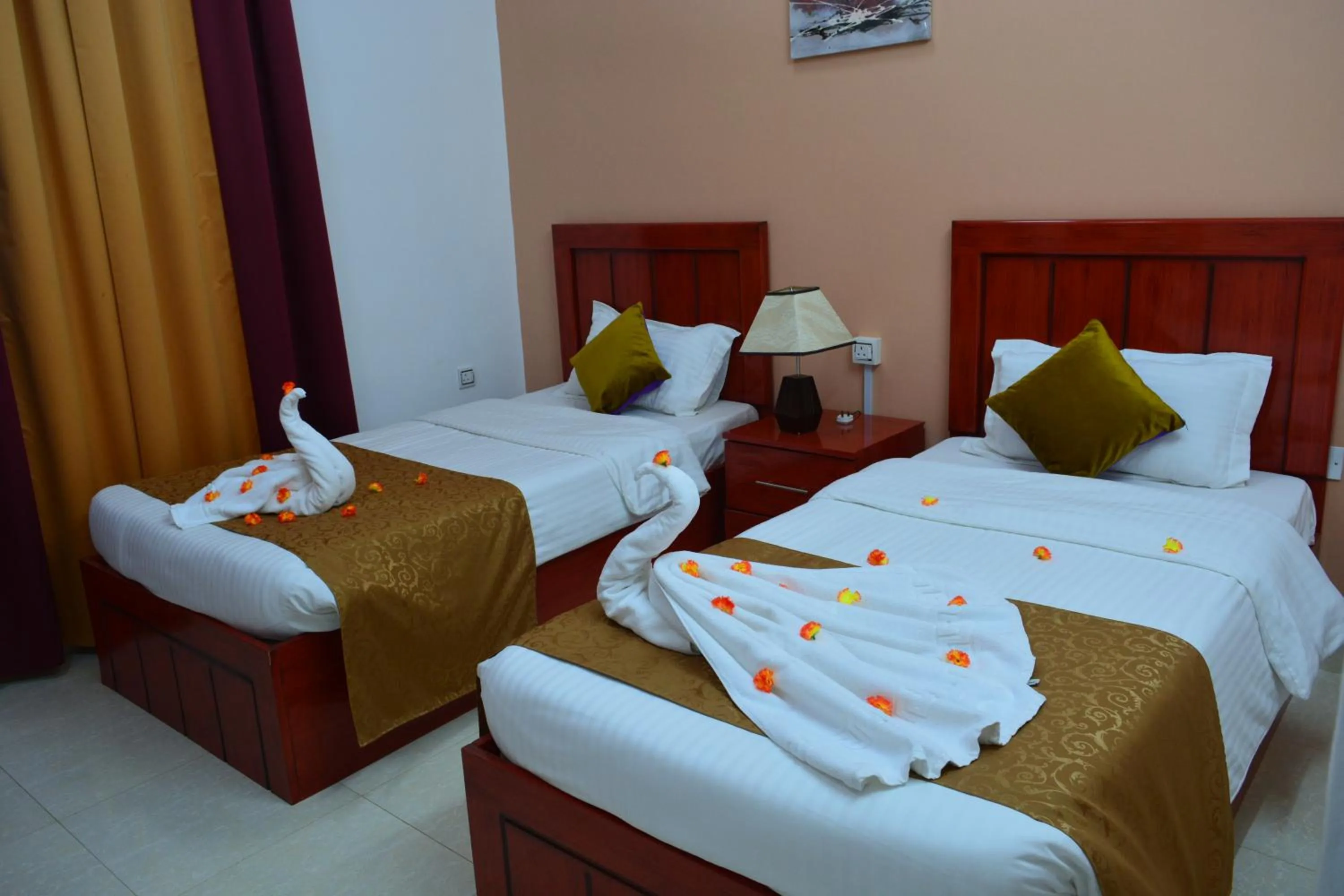 Bed in Al Karam Hotel Apartment