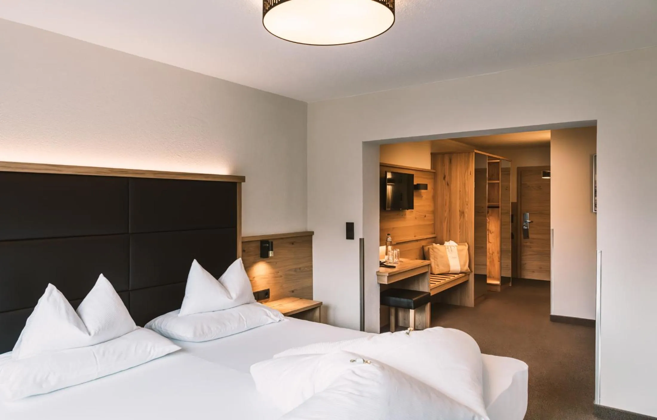 Seating area, Bed in Hotel Arzlerhof