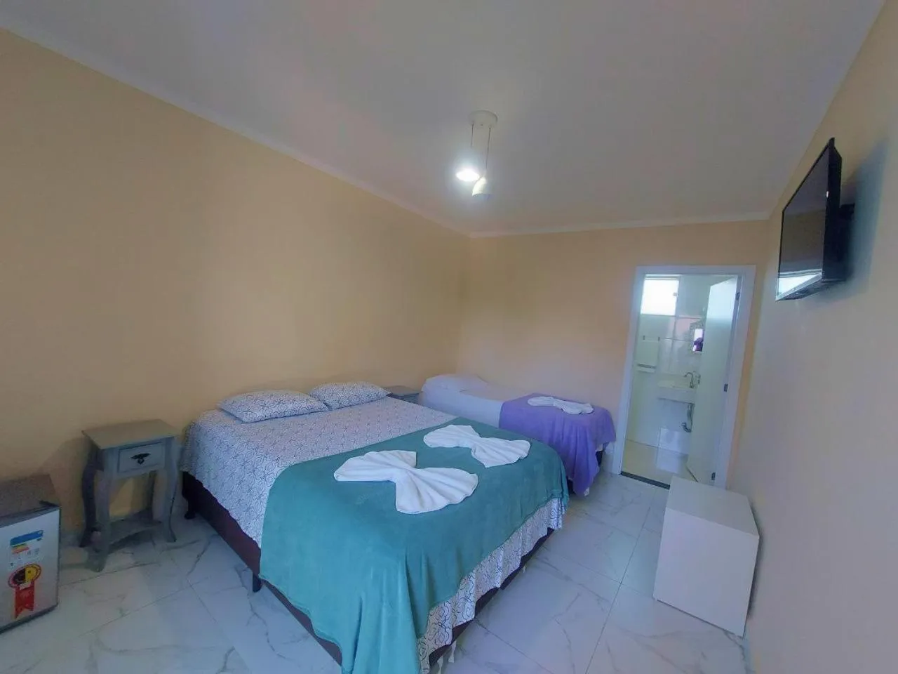 Bed in Pousada Cavalero