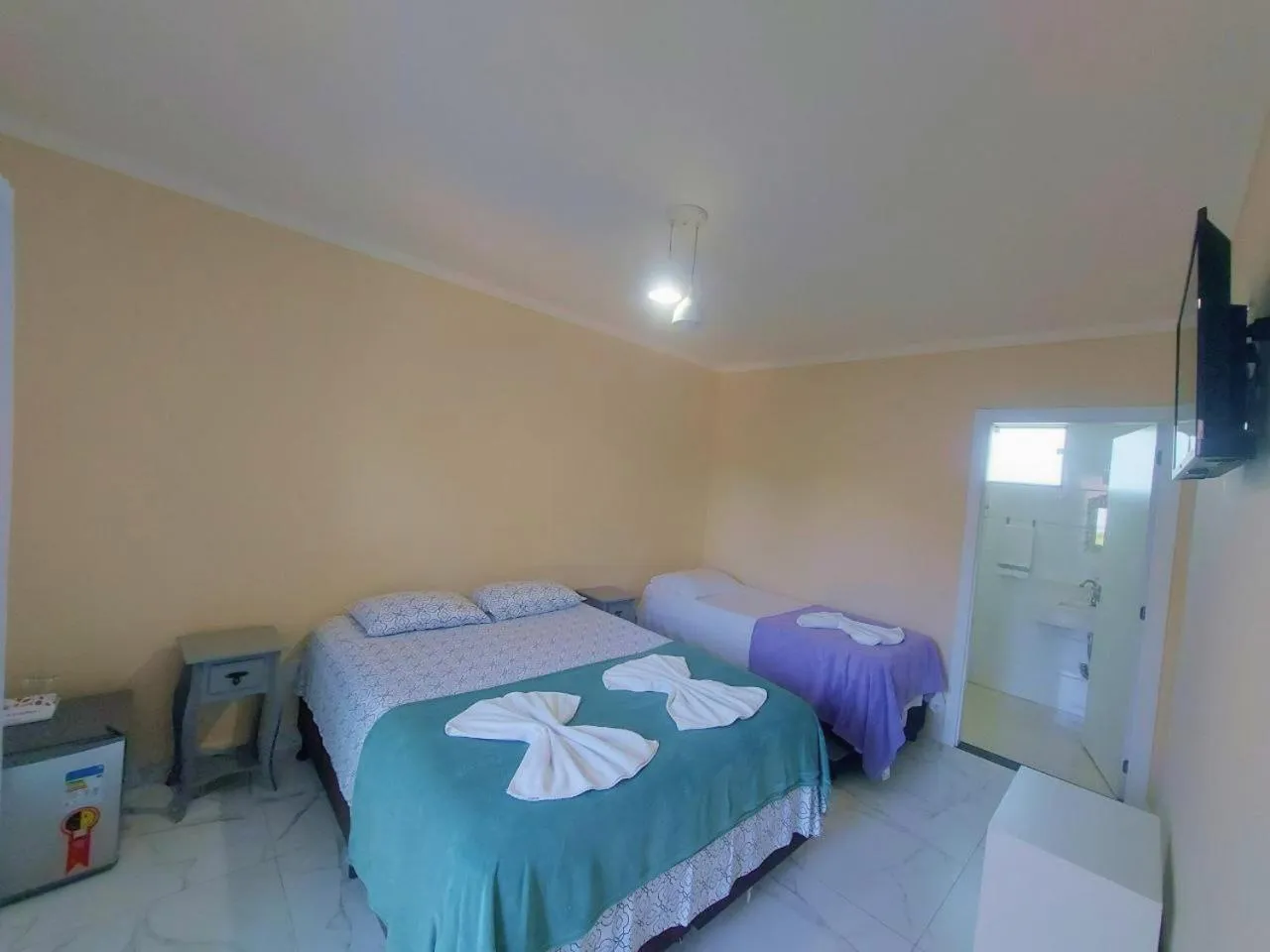 Bed in Pousada Cavalero