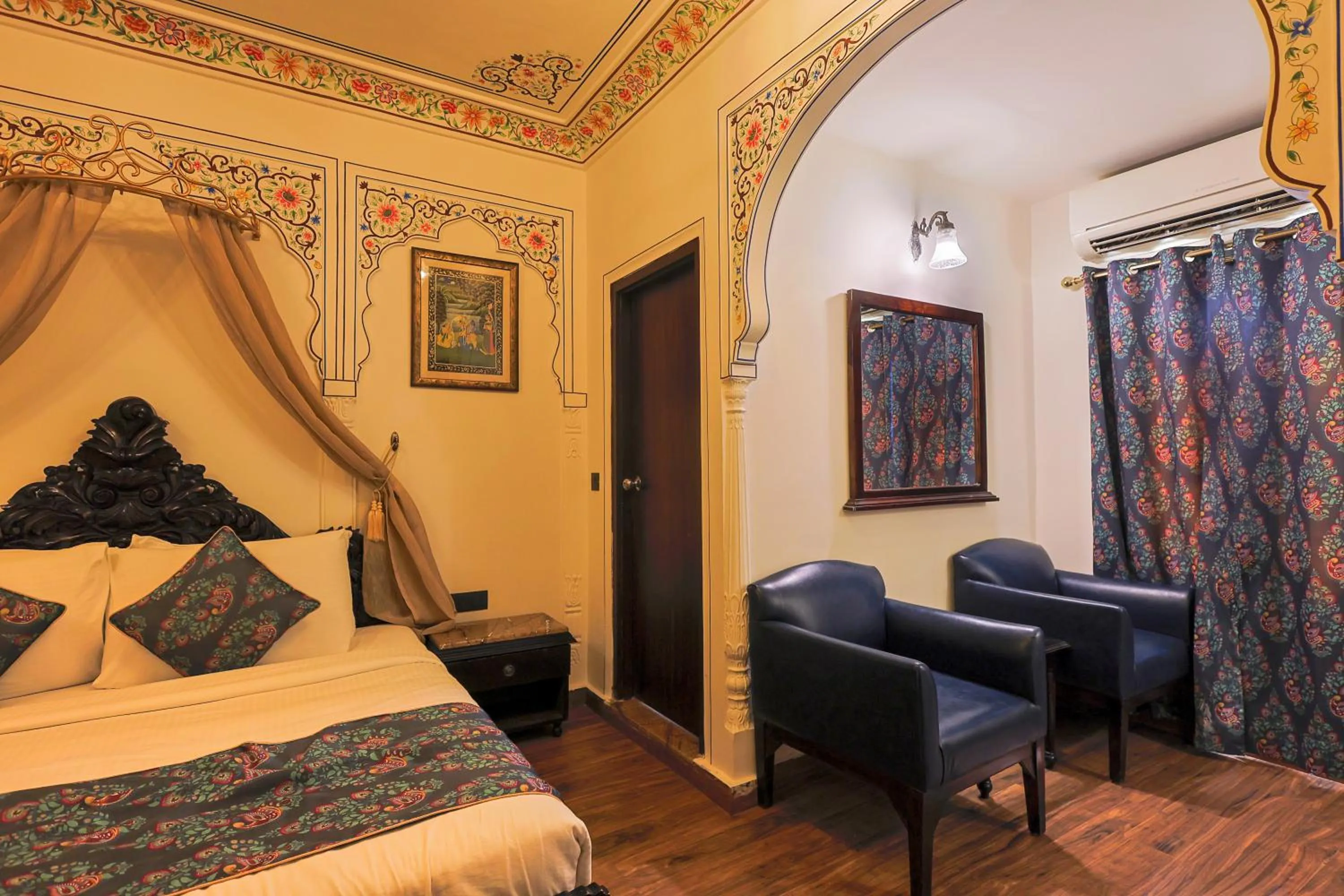 Seating area, Bed in WelcomHeritage Traditional Haveli