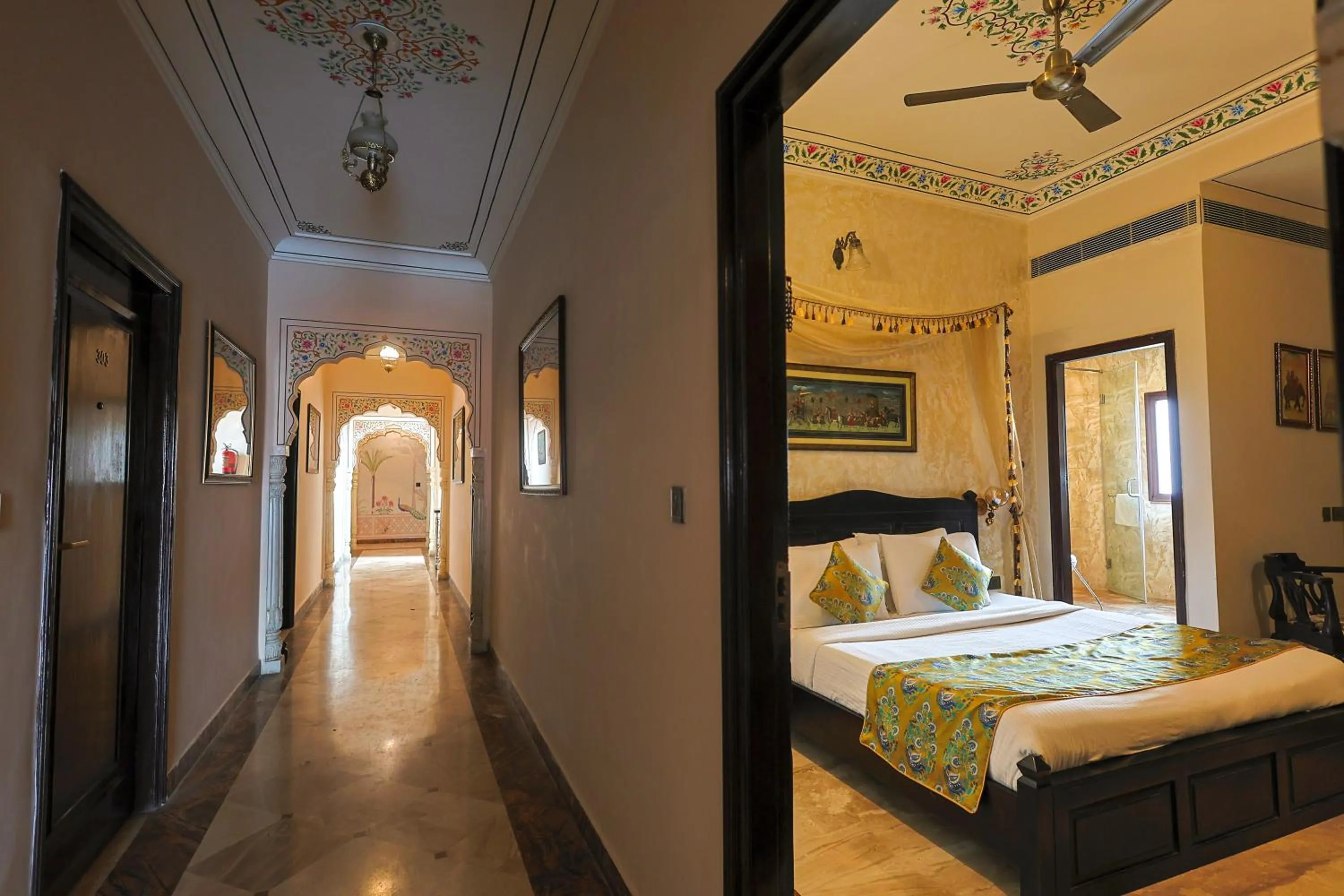Bed in WelcomHeritage Traditional Haveli