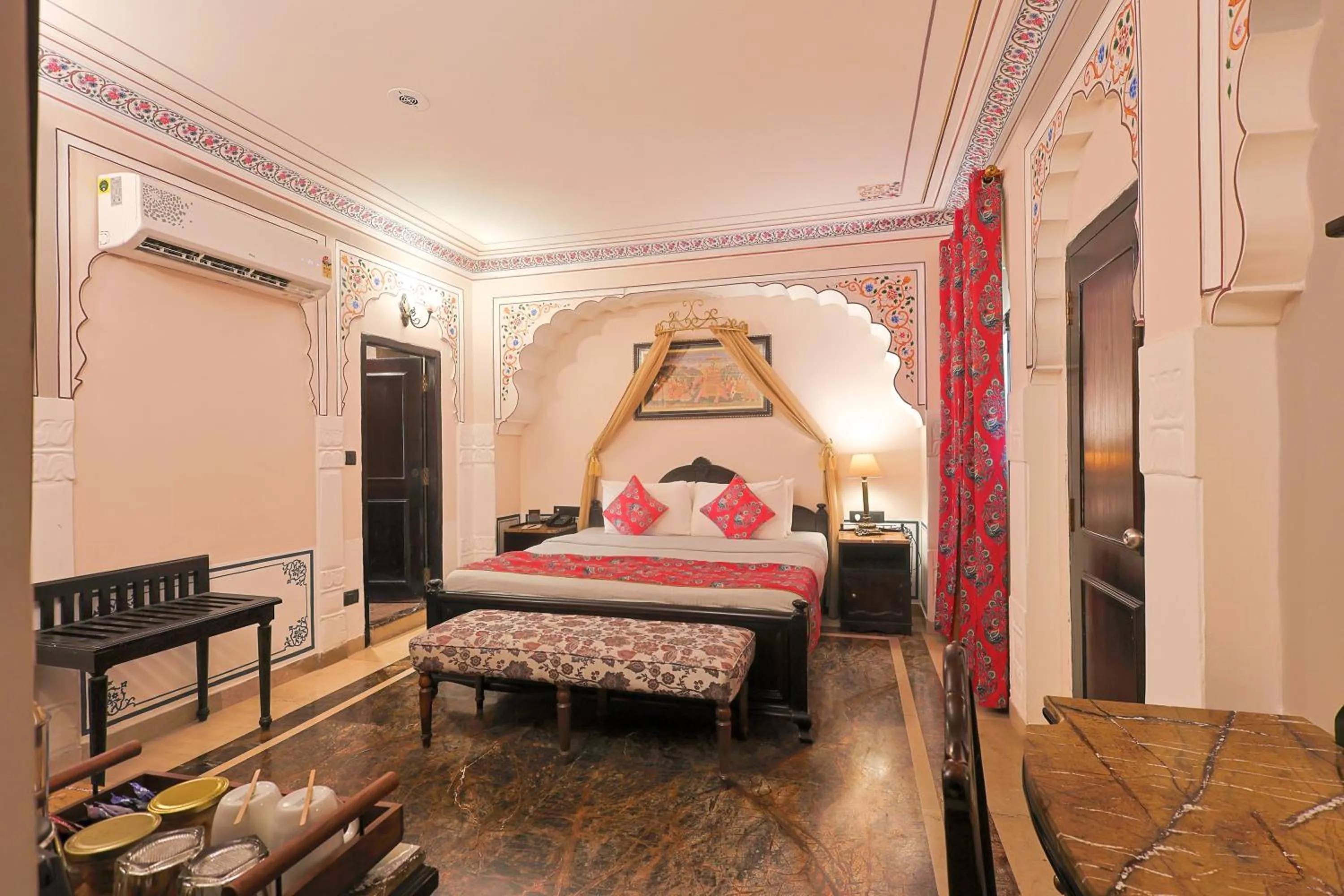Living room, Bed in WelcomHeritage Traditional Haveli
