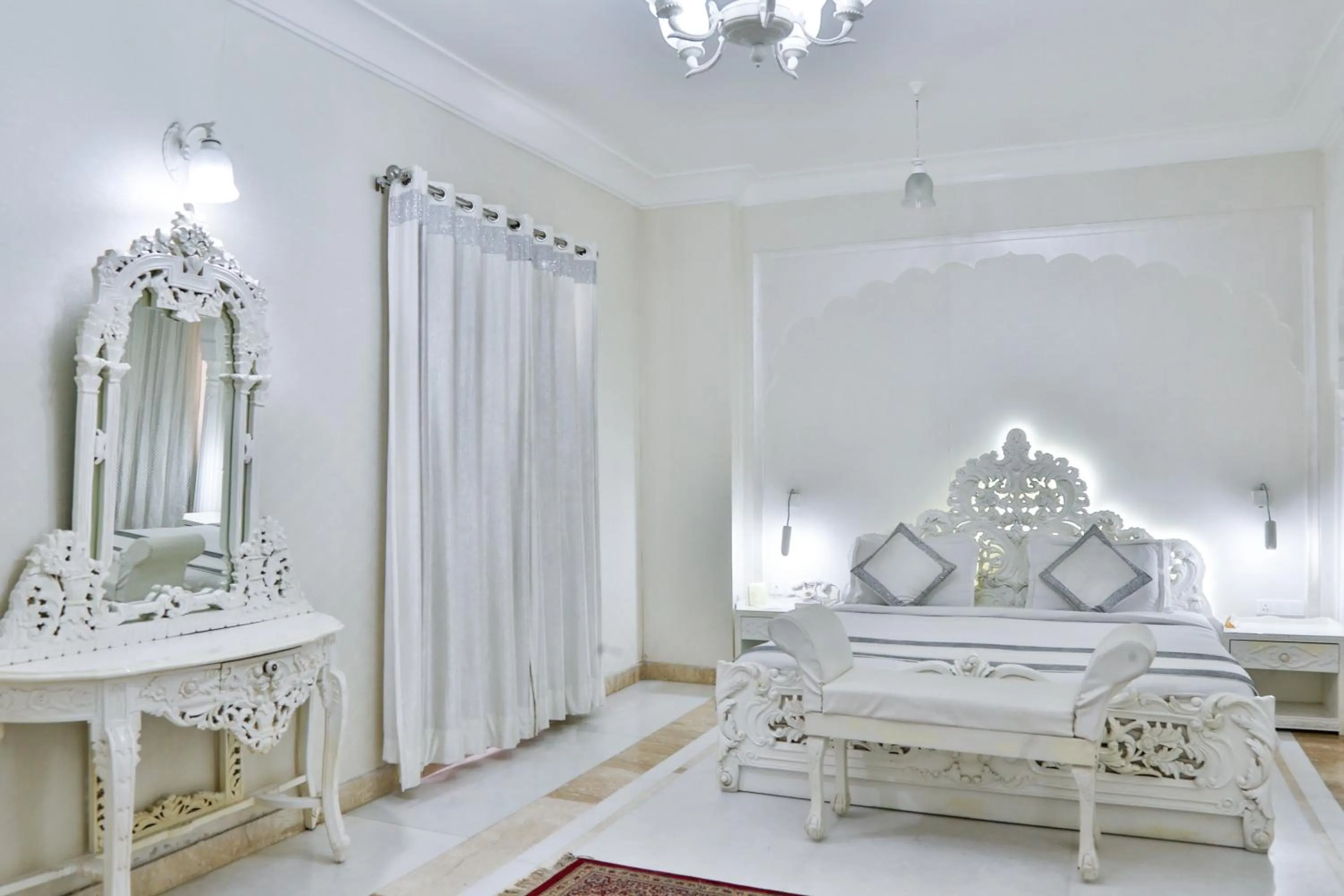 Living room, Bed in WelcomHeritage Traditional Haveli