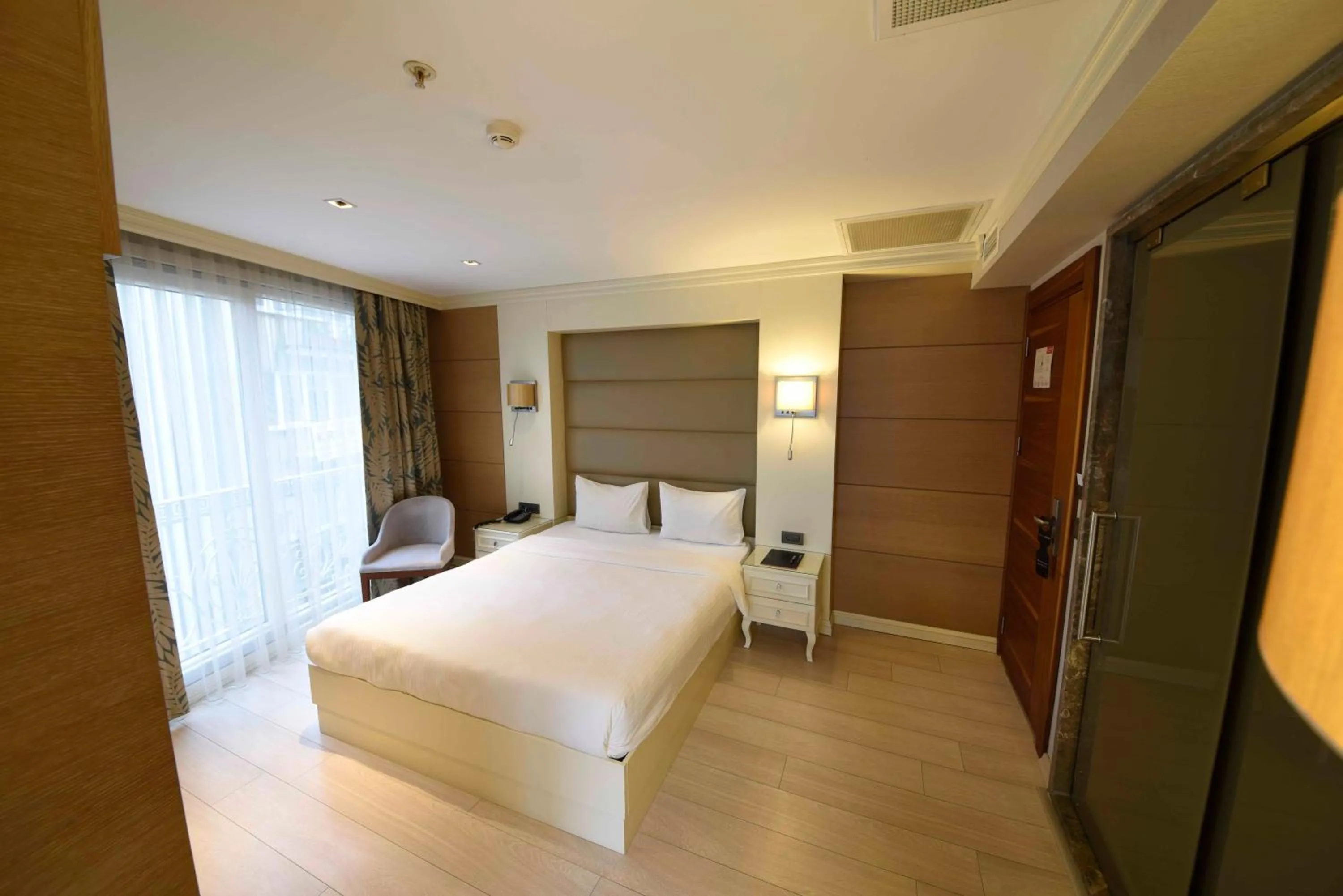 Bed in Hotel Le Mirage