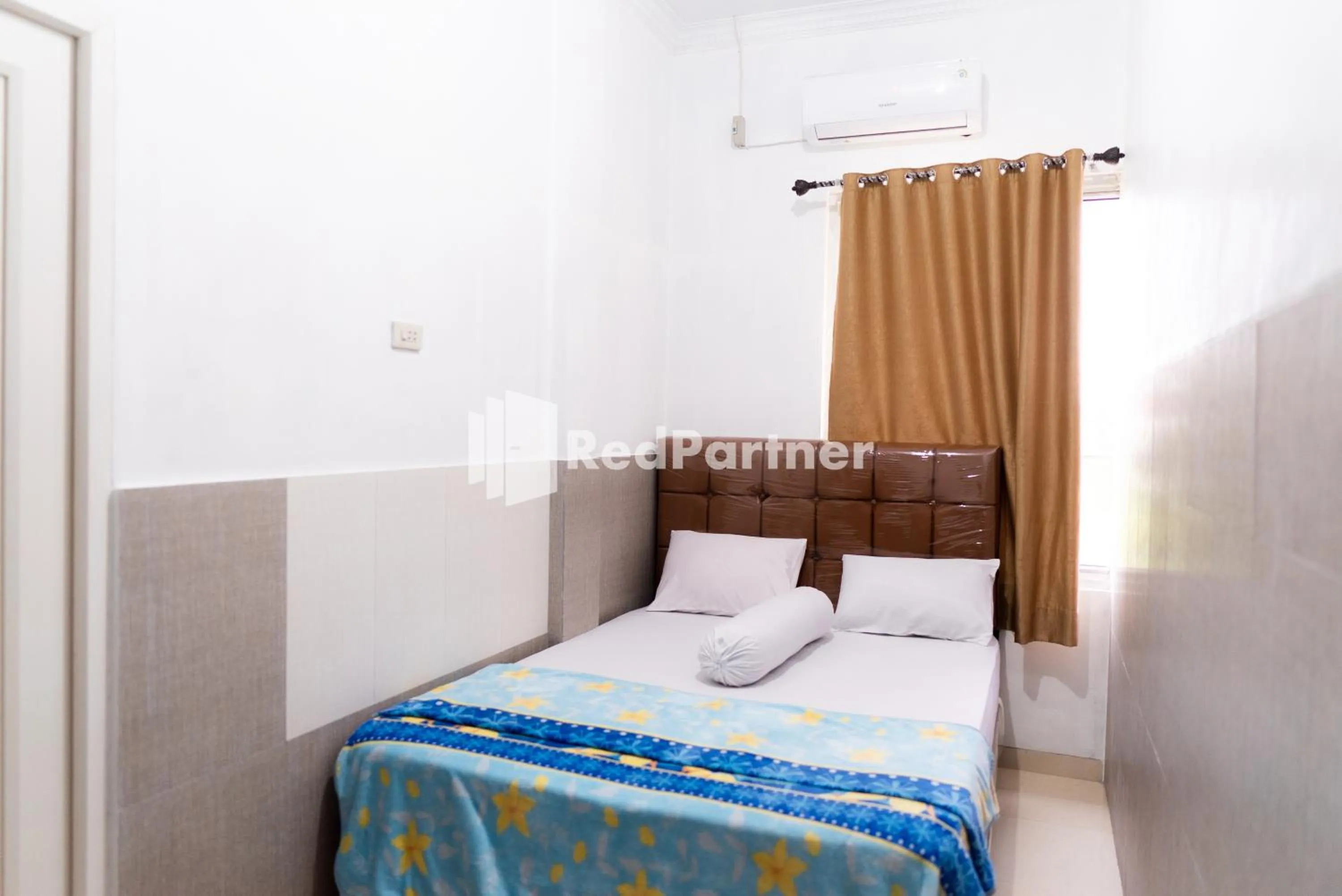 Bedroom in ITR Homestay RedPartner