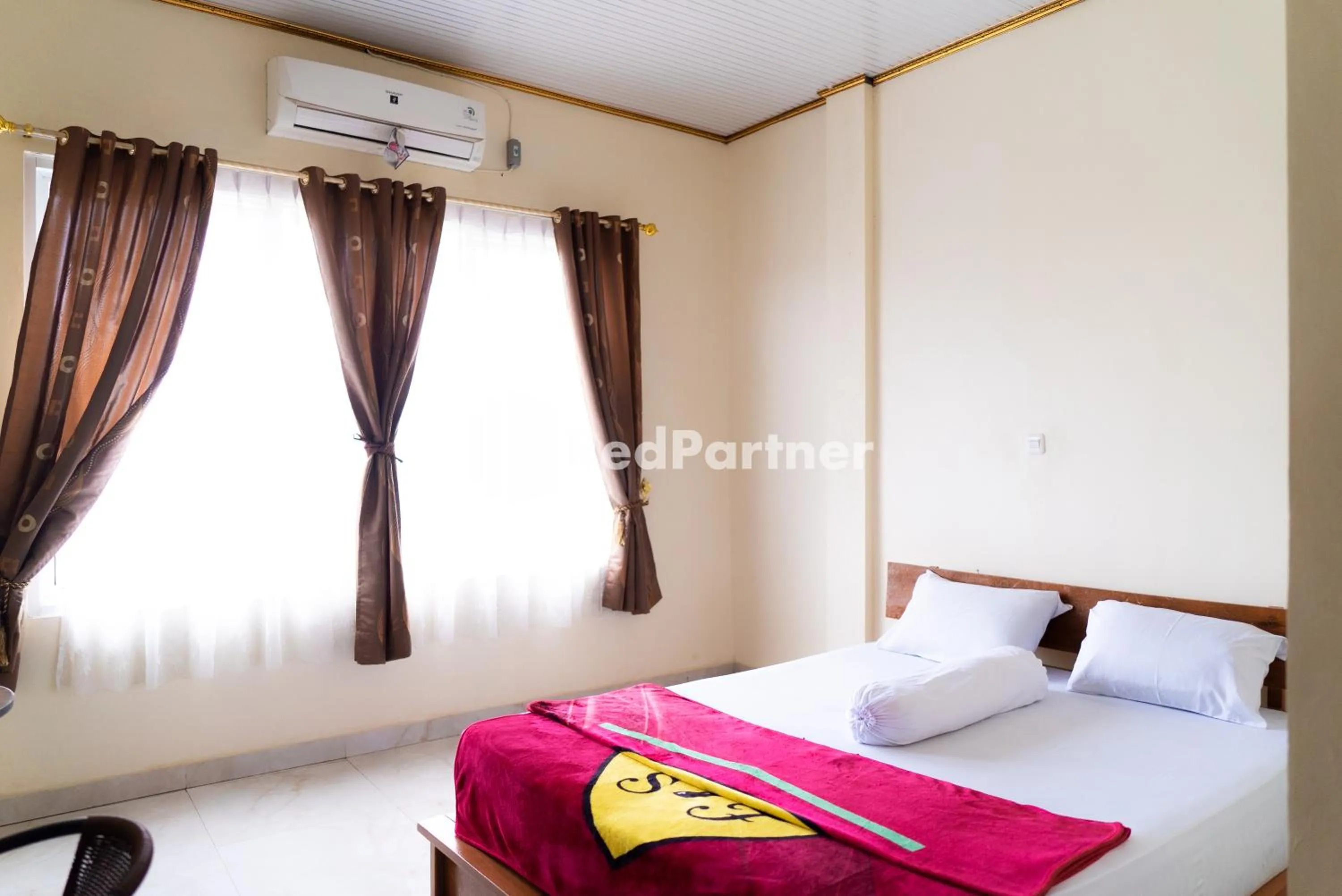 Bedroom in ITR Homestay RedPartner
