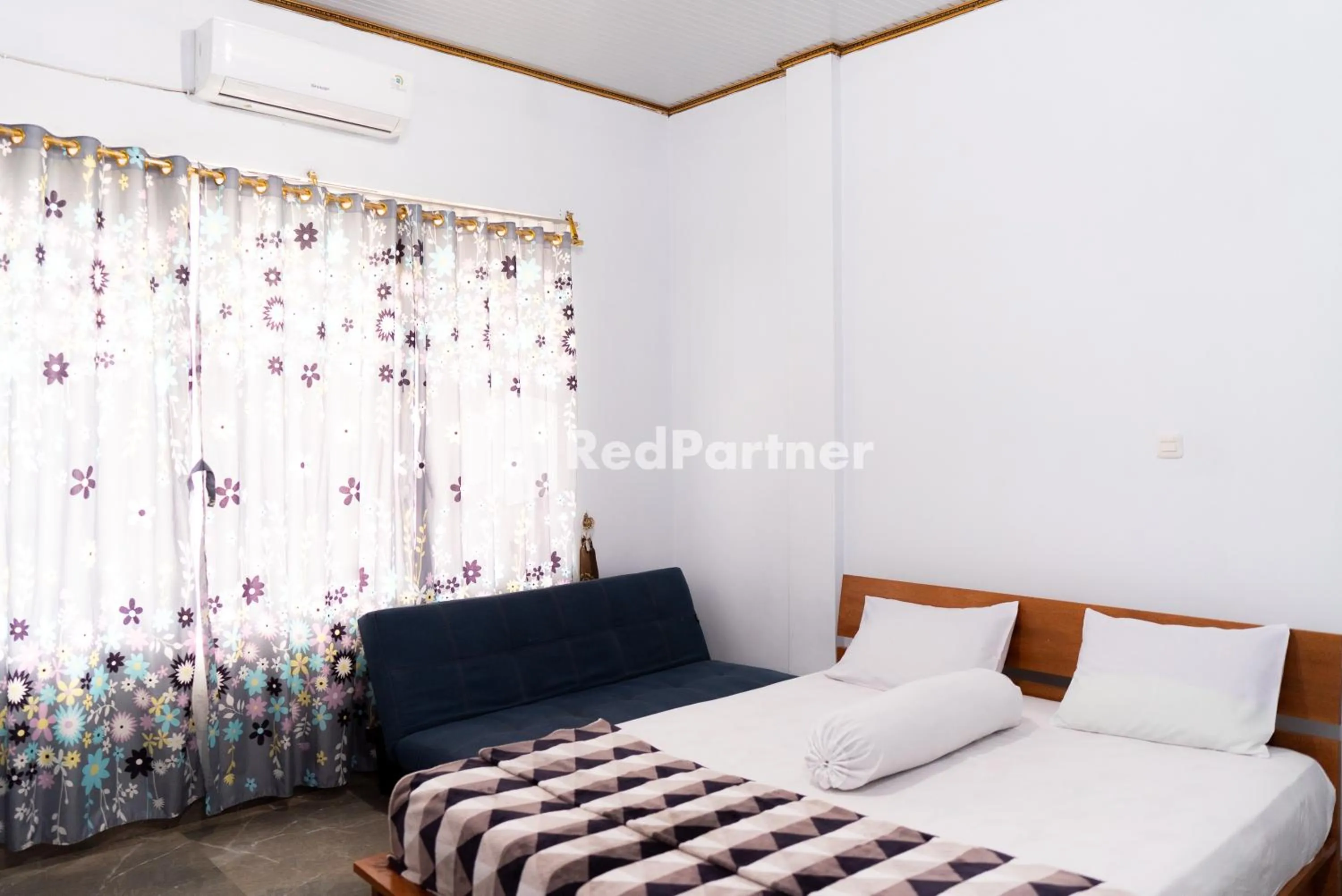 Bedroom in ITR Homestay RedPartner
