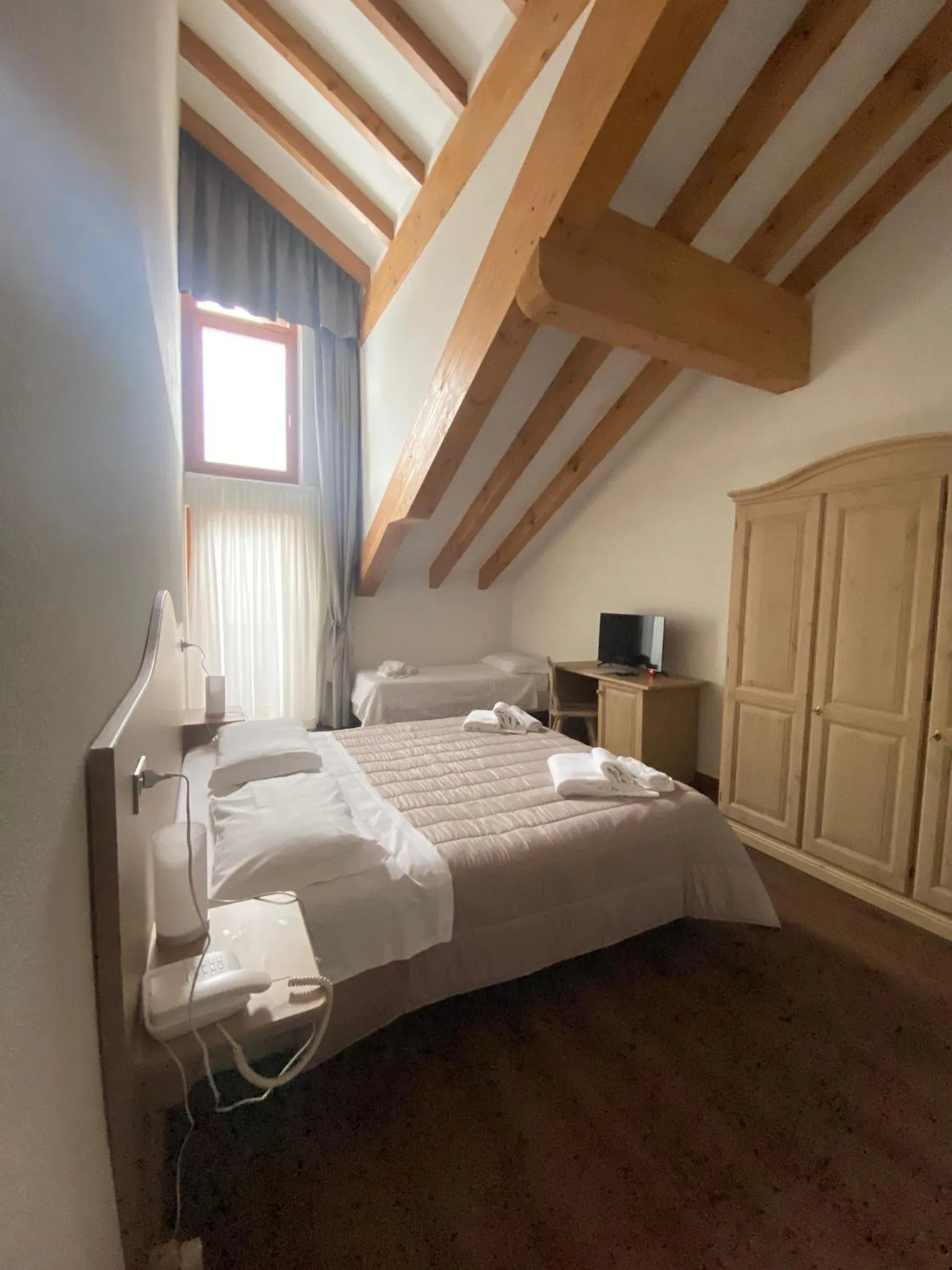 Bed in Hotel Villa Aurora