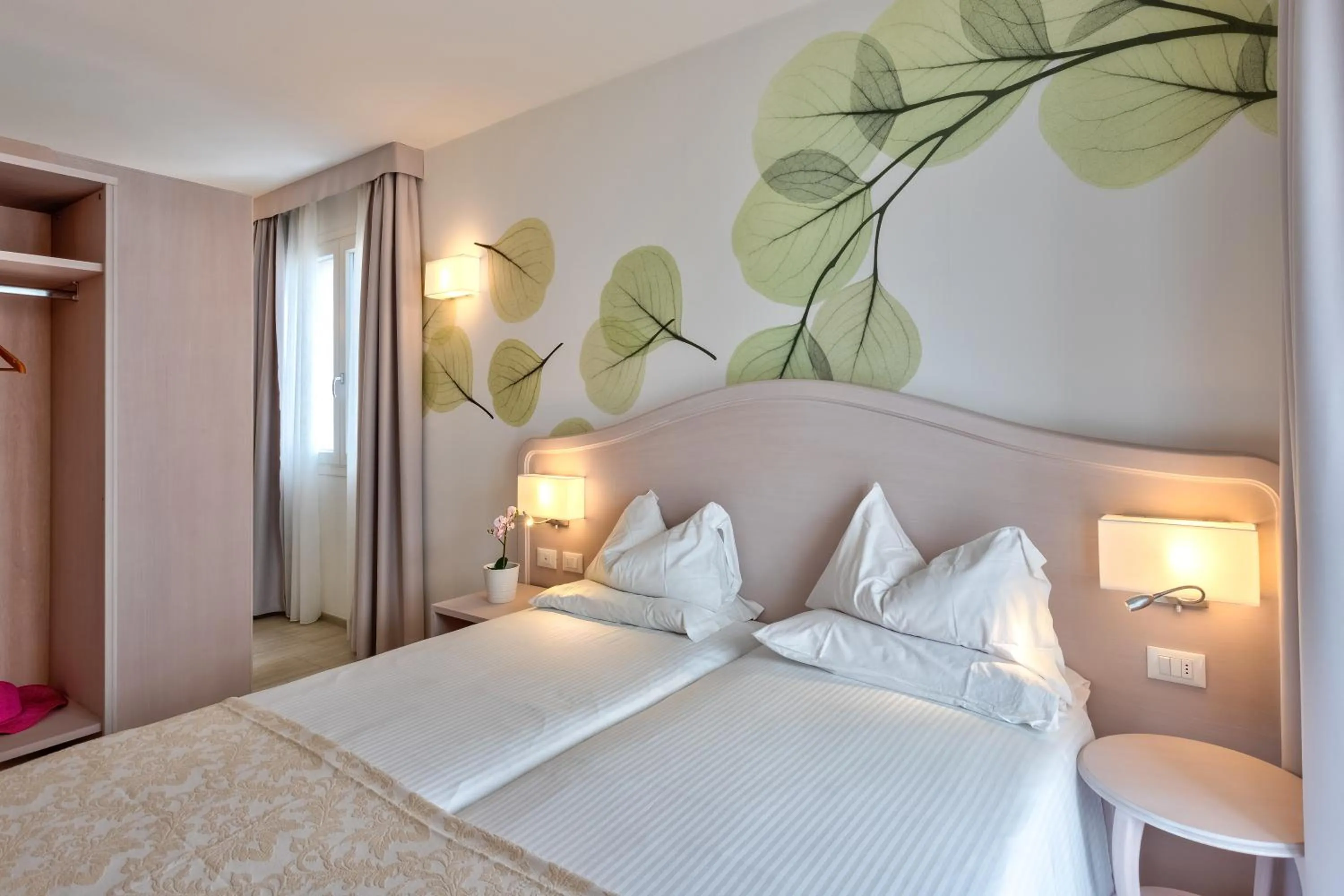 Bed in Hotel Riviera Panoramic Green Resort