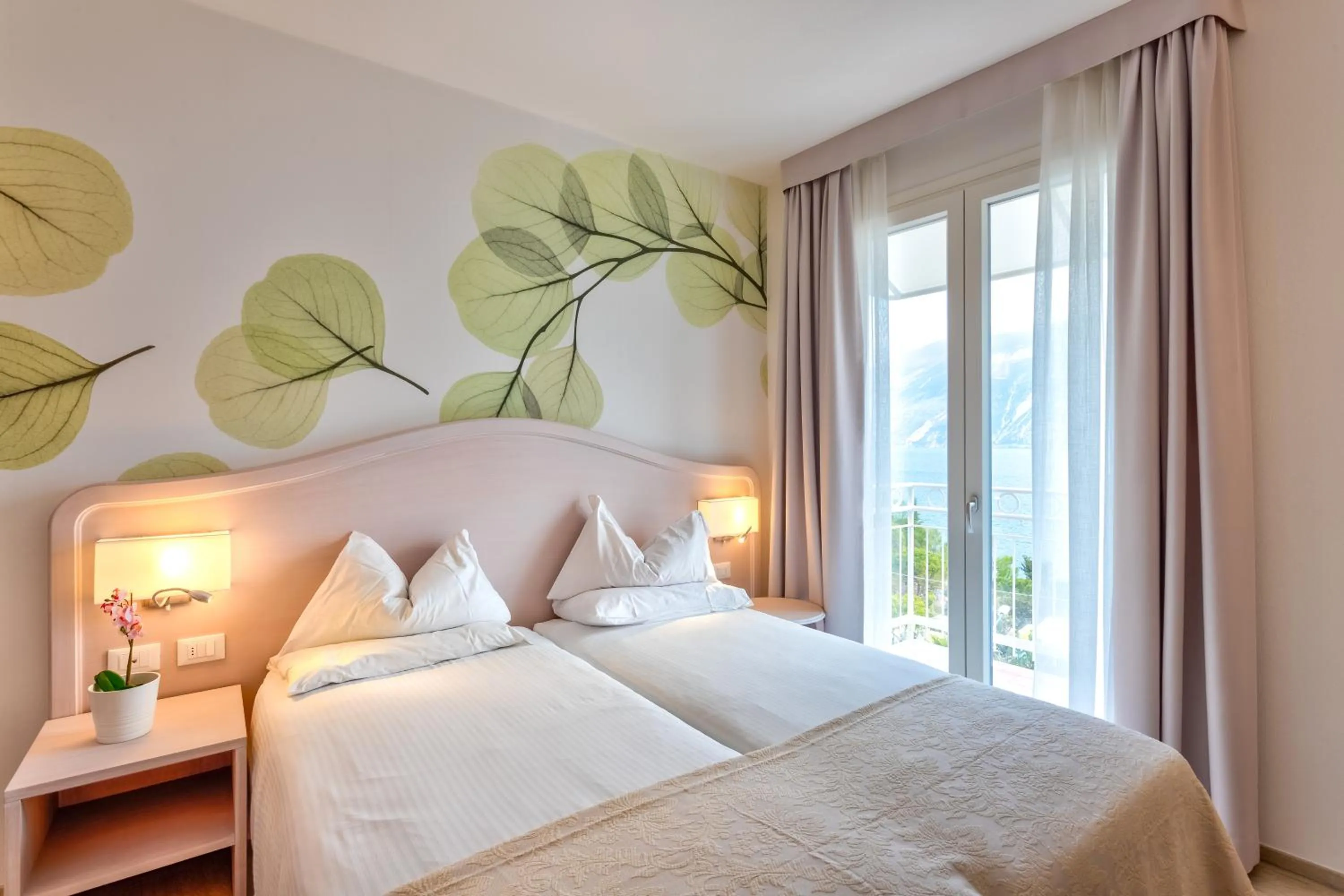 Bed in Hotel Riviera Panoramic Green Resort