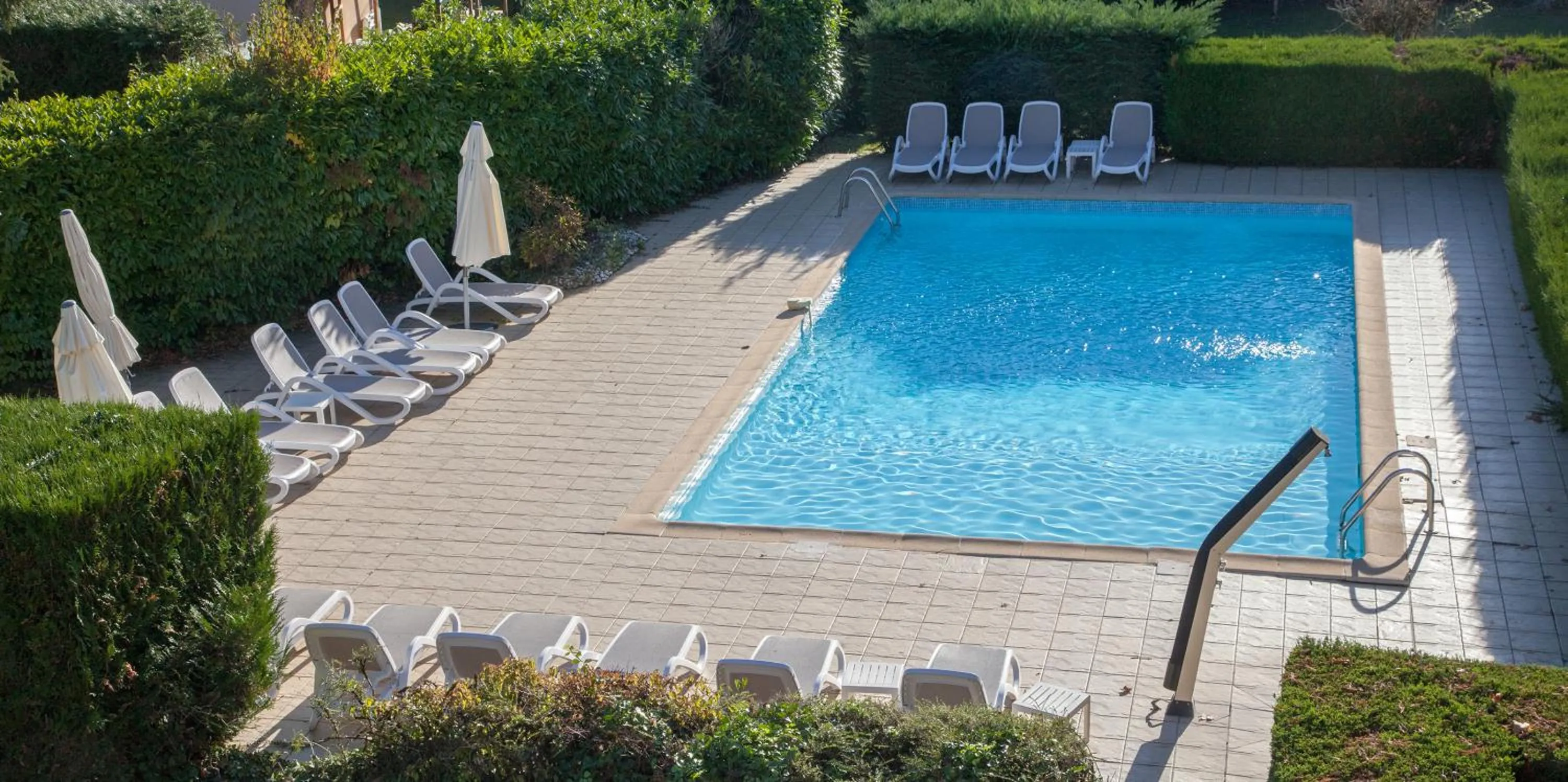 Pool view in Hôtel La Hoirie