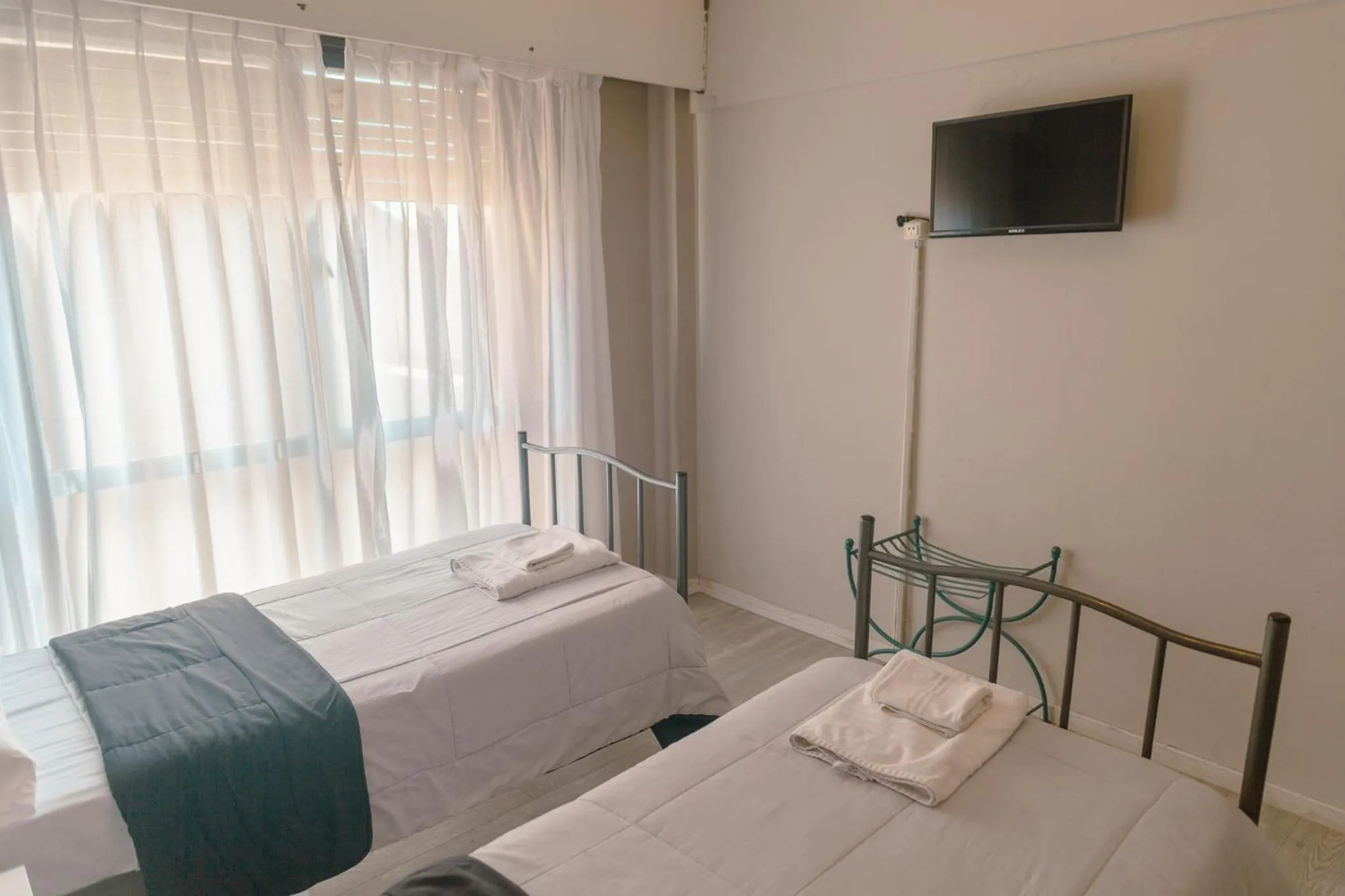 Bed in Rayentray Hostal