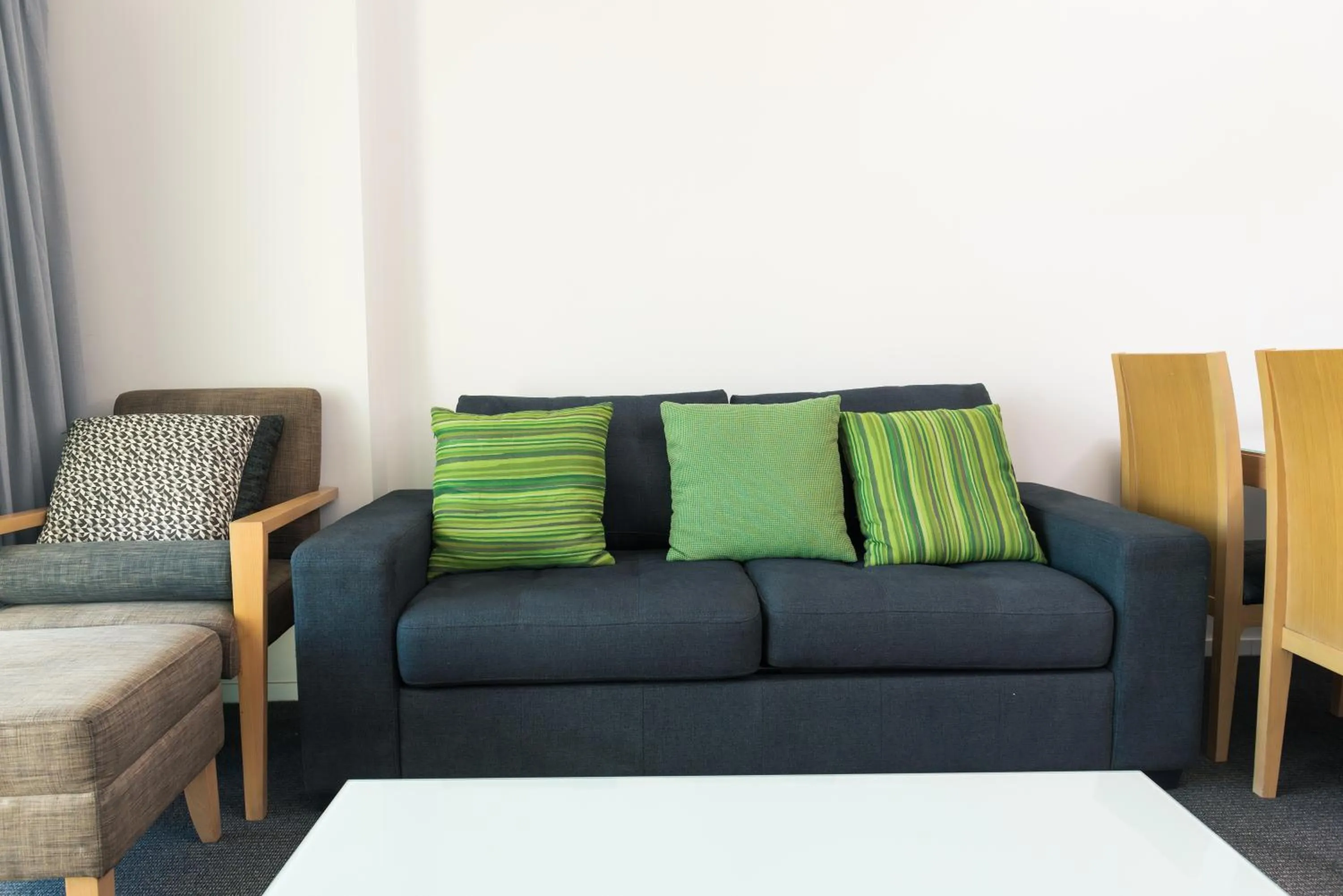 Seating area in Darwin Harbour Suites