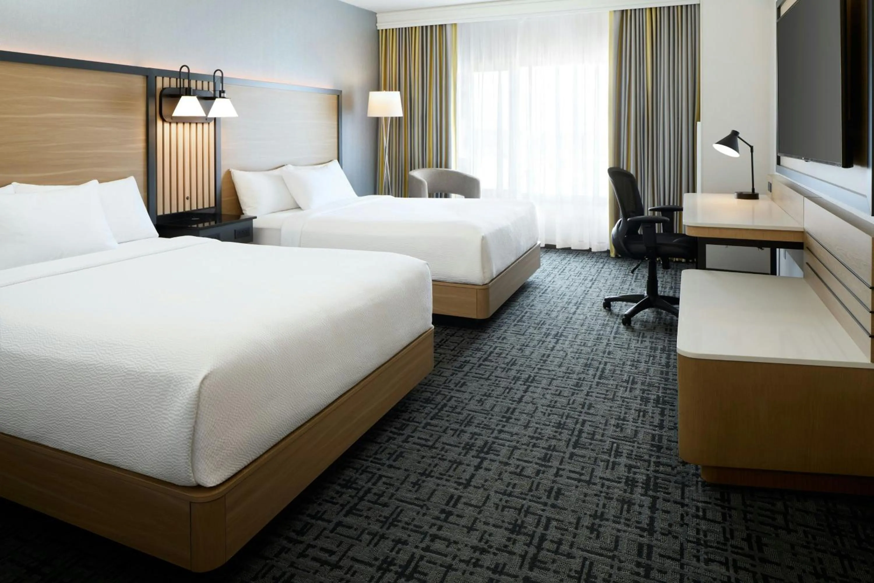 Photo of the whole room, Bed in Fairfield Inn & Suites by Marriott Montreal Airport