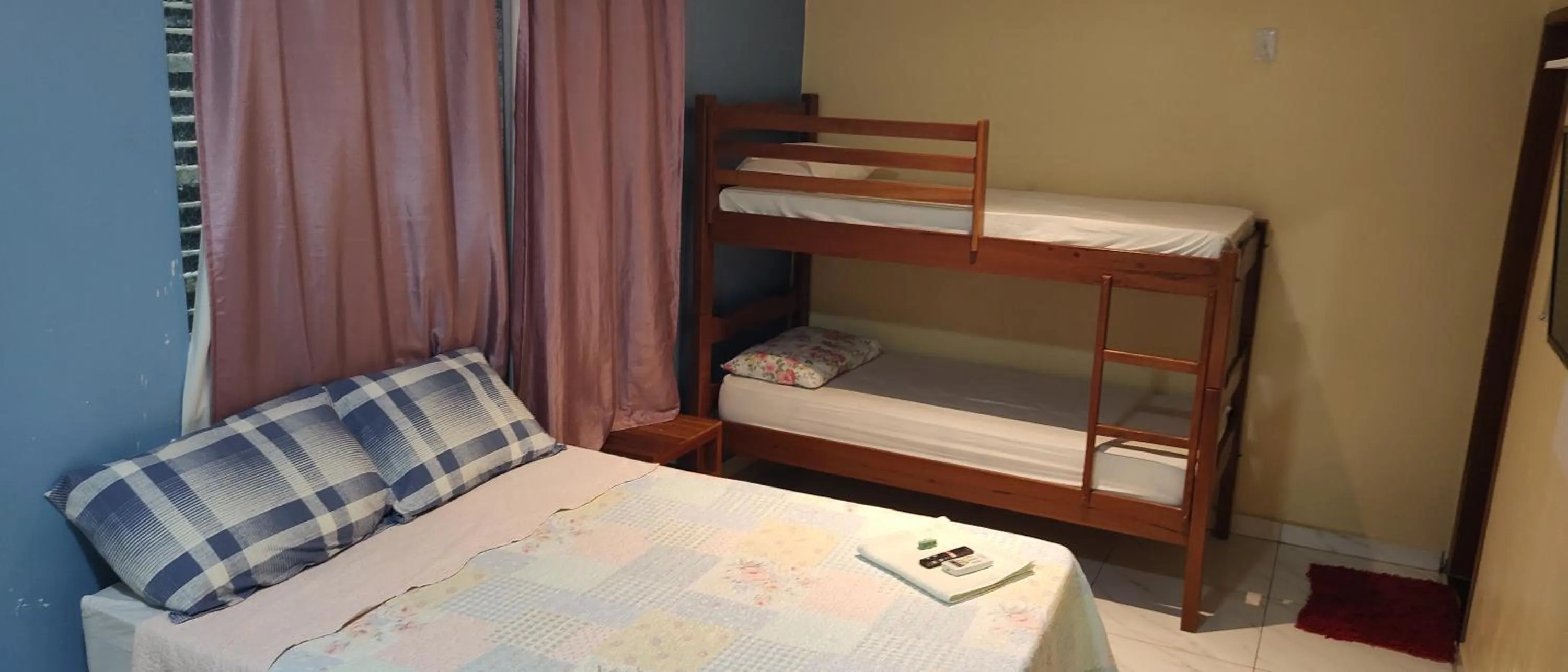 Bed in Hotel Jardim Tropical