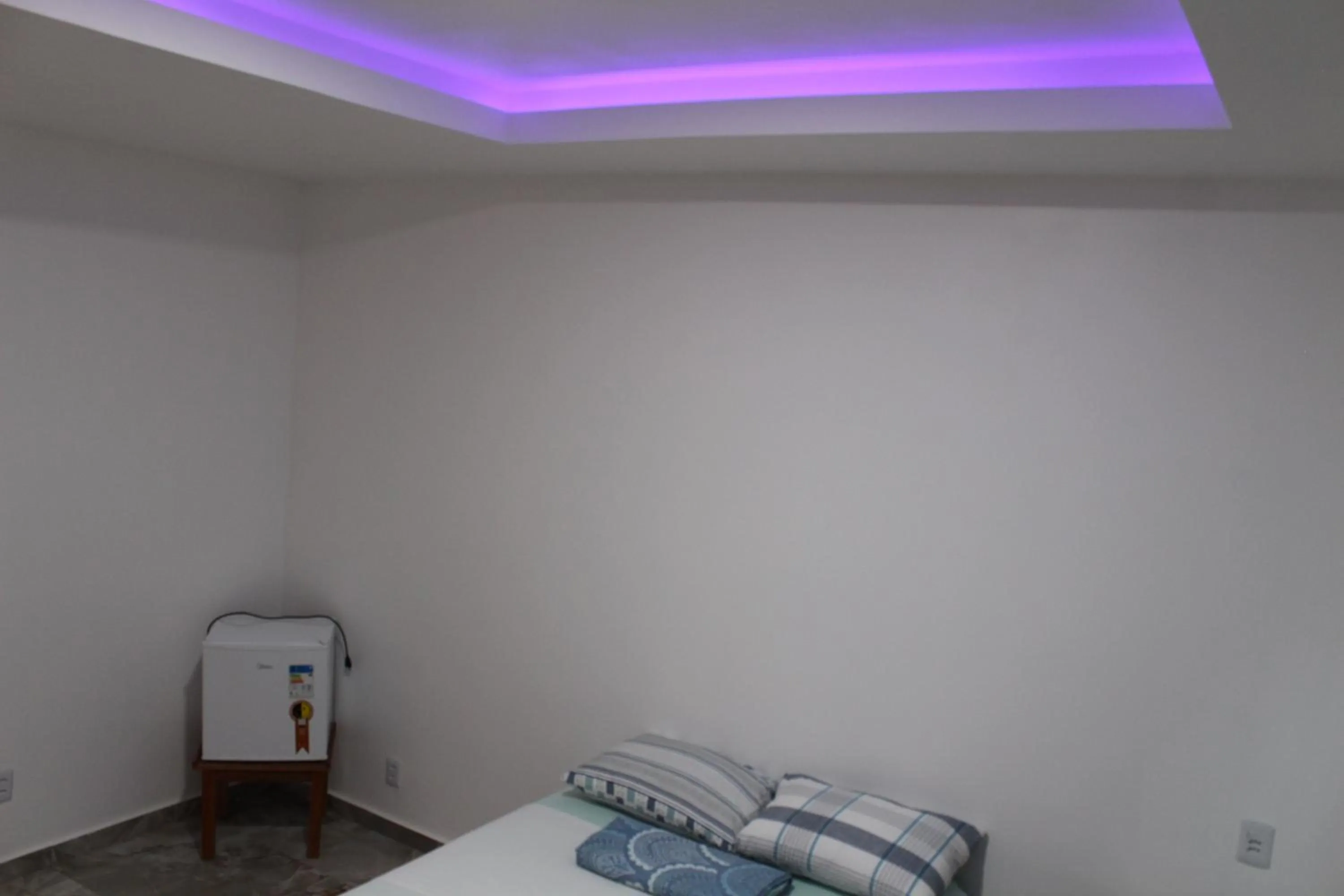 Bed in Hotel Jardim Tropical