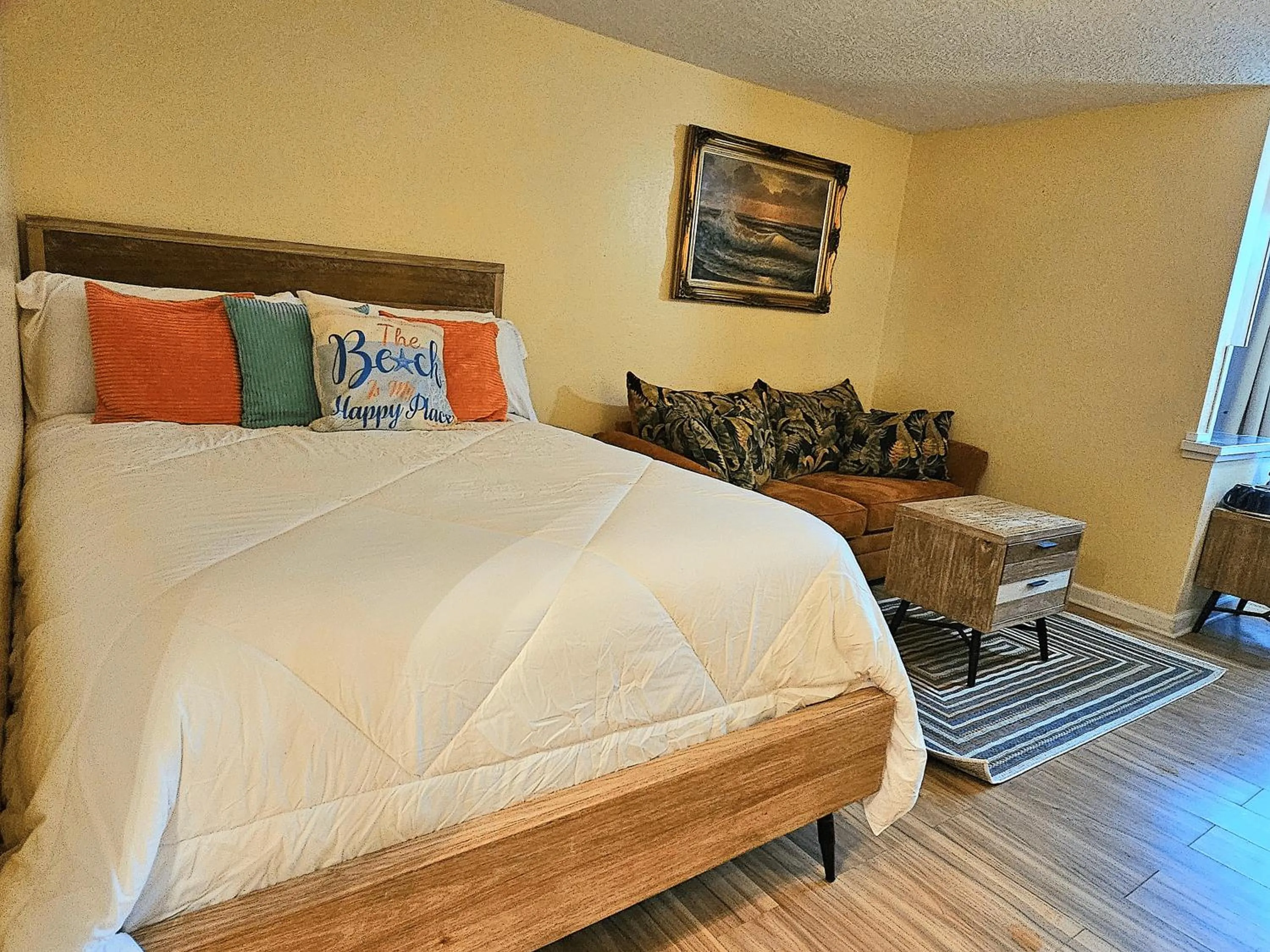 Photo of the whole room, Bed in Oceanfront Escape With Balcony and heated salt water pool Sleeps 4
