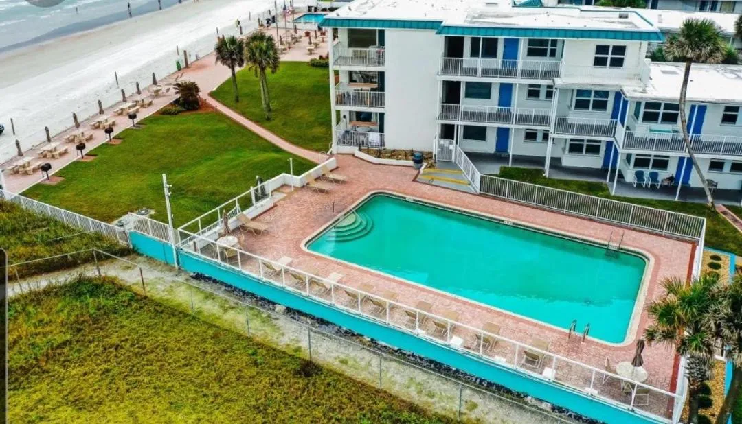 Oceanfront Escape With Balcony and heated salt water pool Sleeps 4