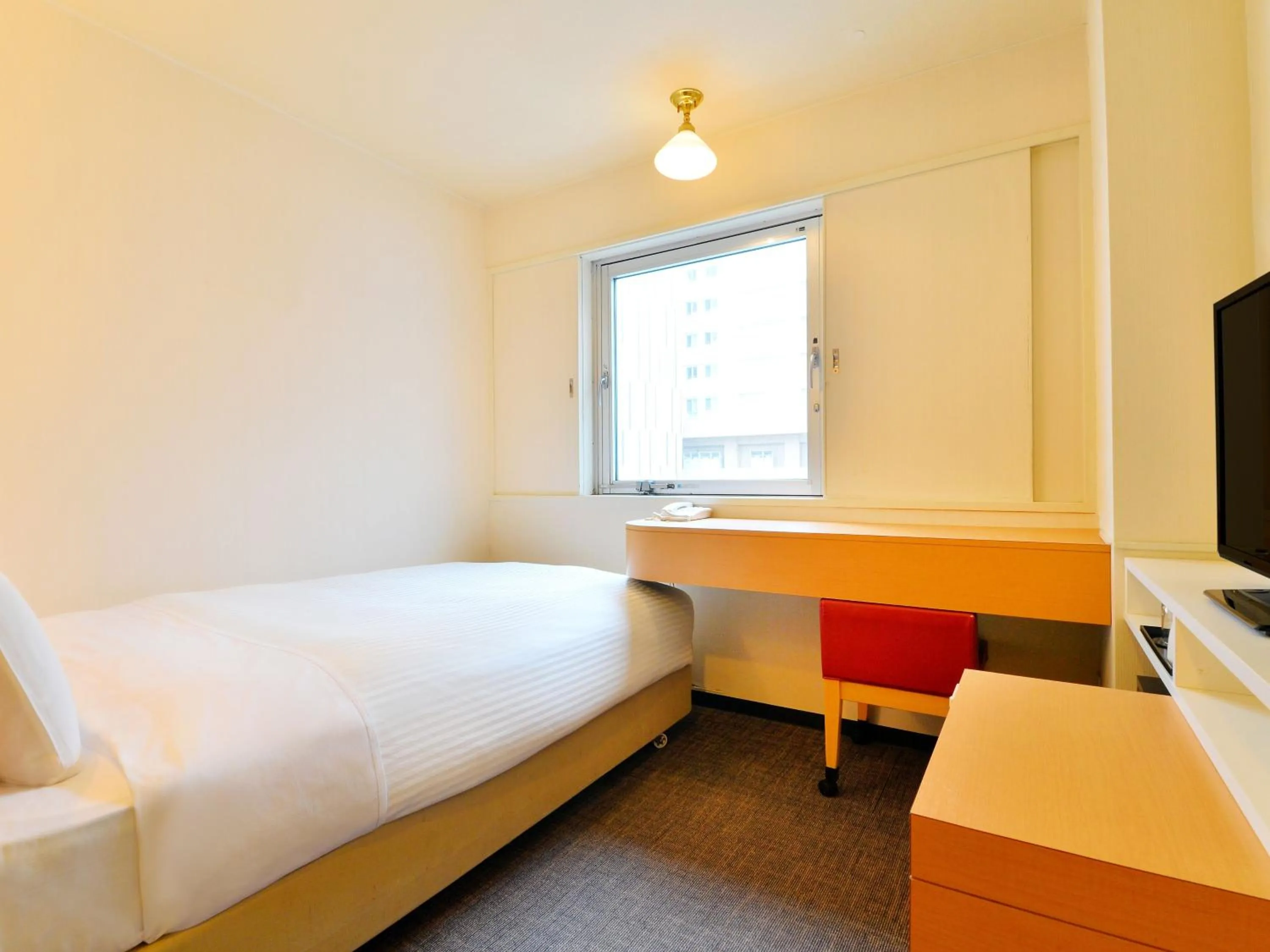 Photo of the whole room, Bed in Smile Hotel Hakodate