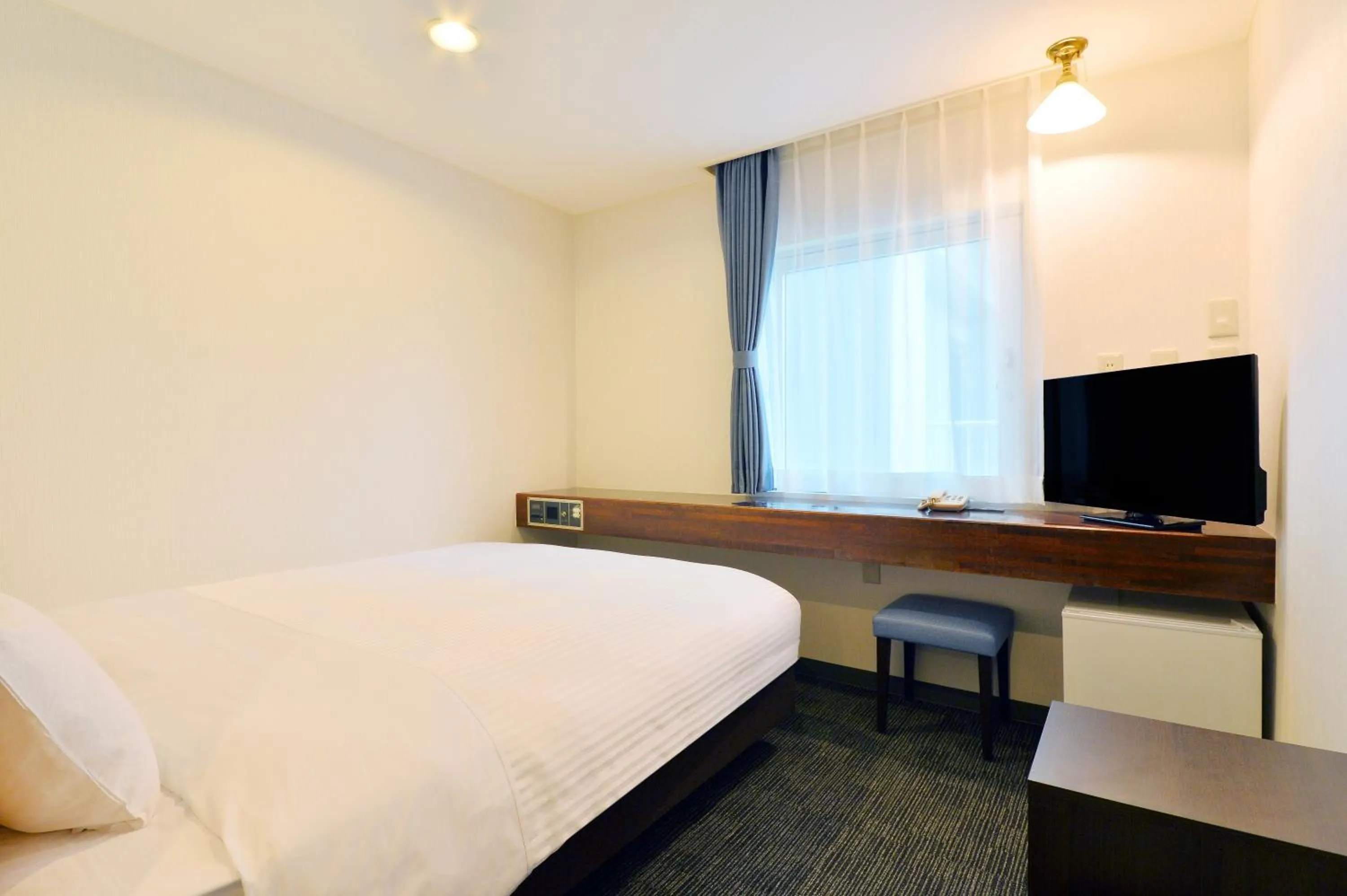 Bed in Smile Hotel Hakodate