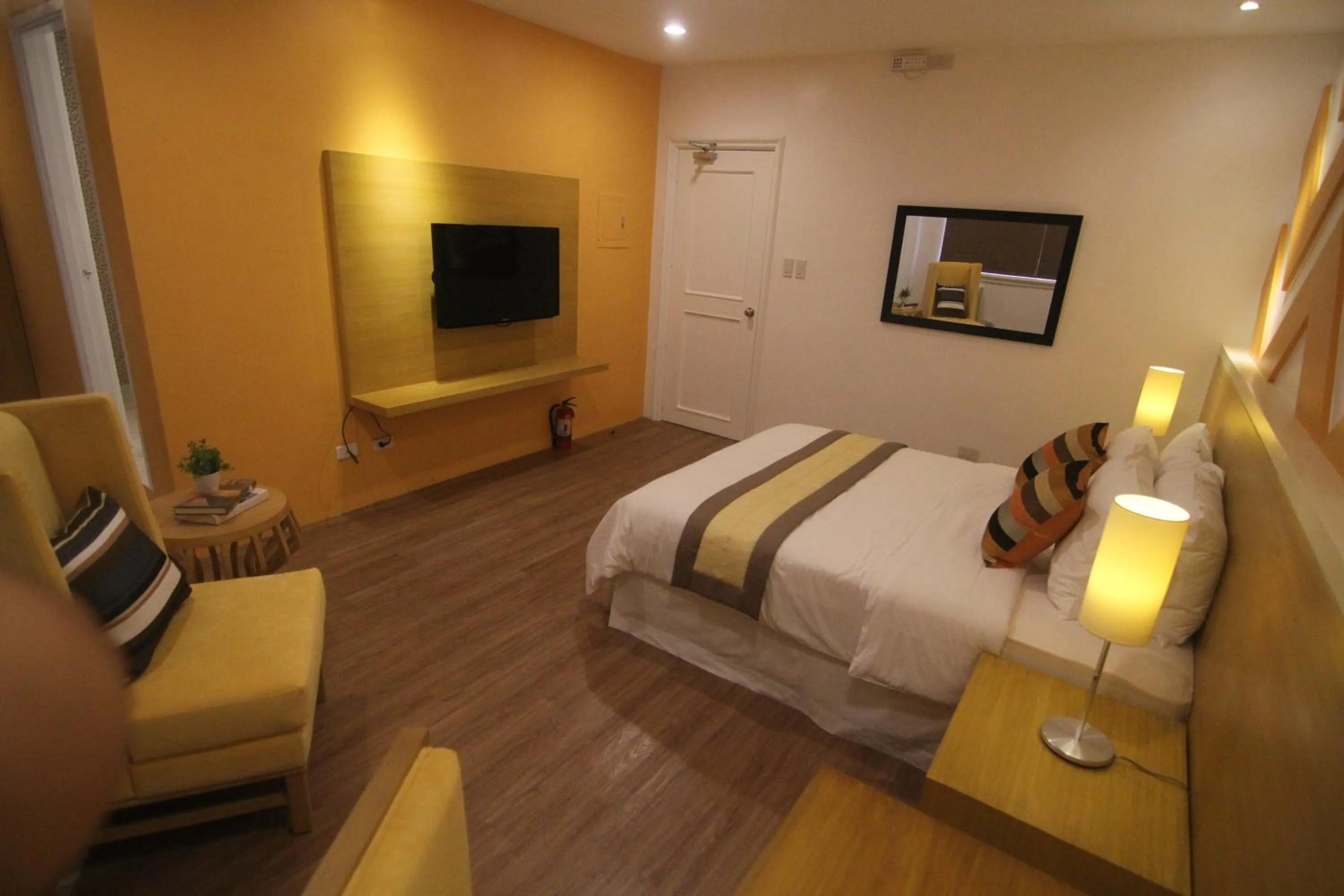 Bed in Bryan Condo Suites Makati near Airport